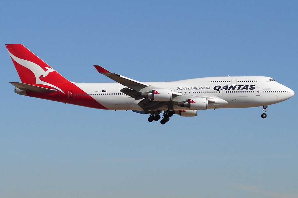 A Qantas Boeing 747-400ER flying in the sky.