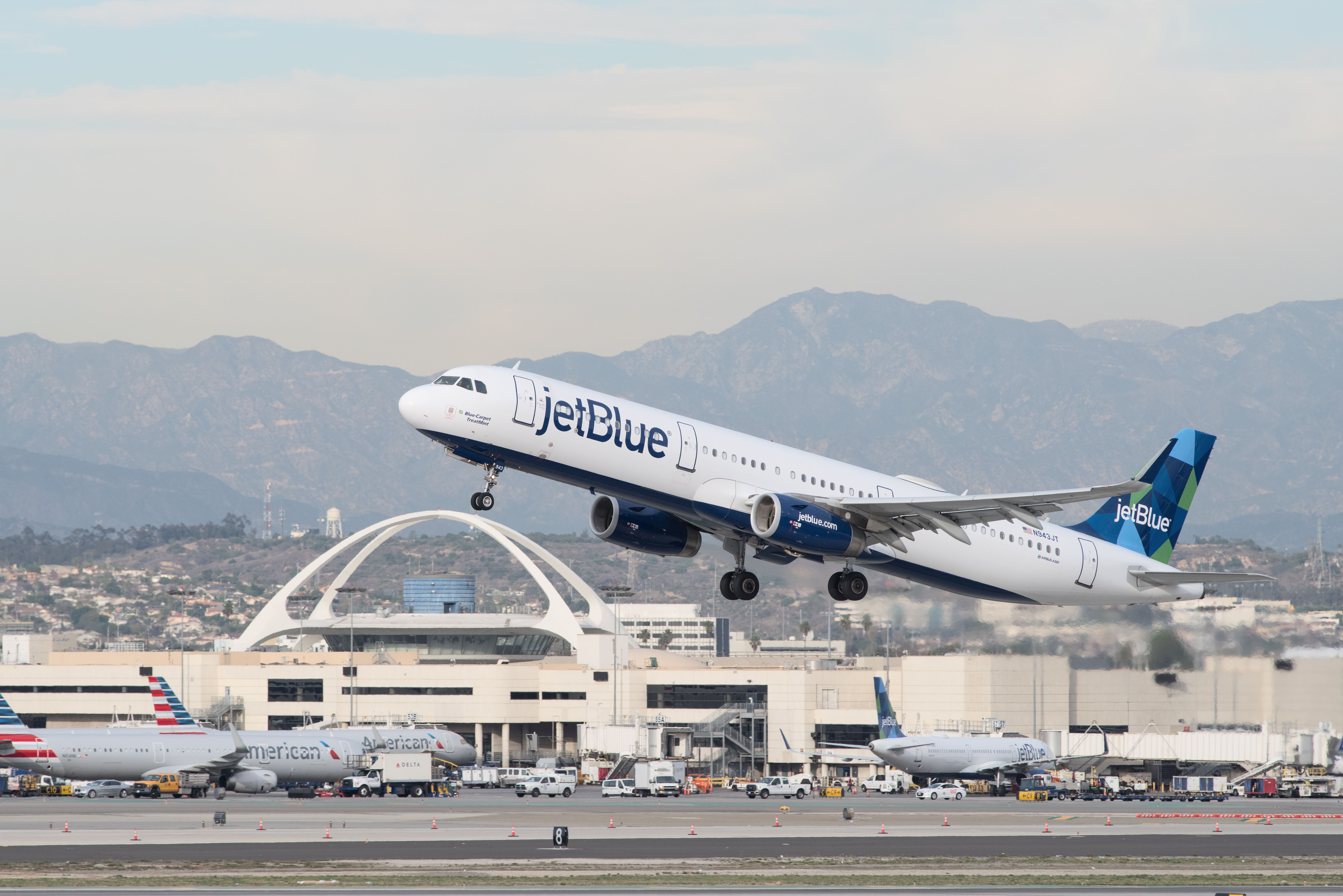 A Jetblue aircraft taking off from LAX.