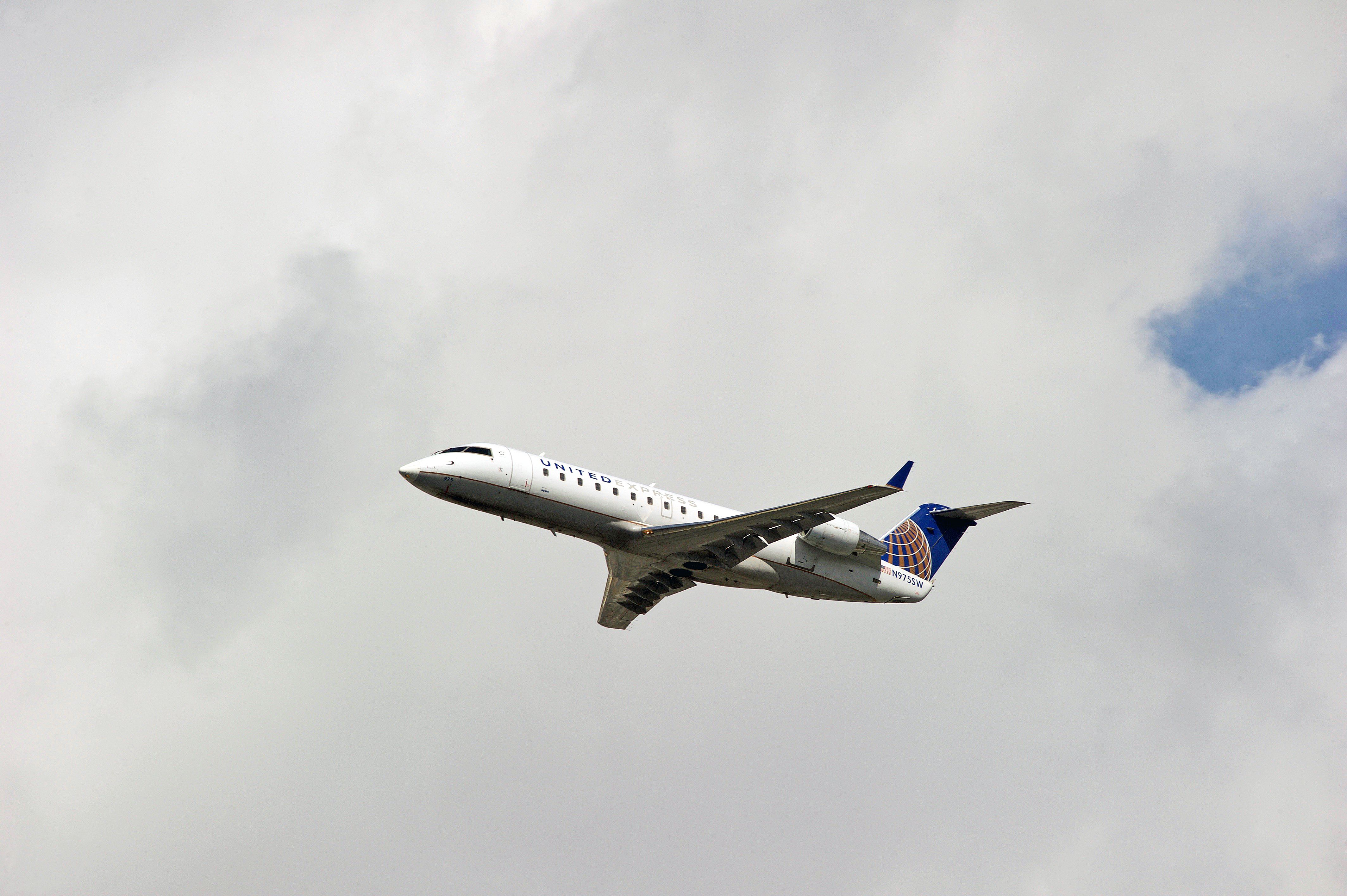 A United Express operated by SkyWest Airlines Bombardier CRJ-200ER aircraft departs Los Angeles International Airport.