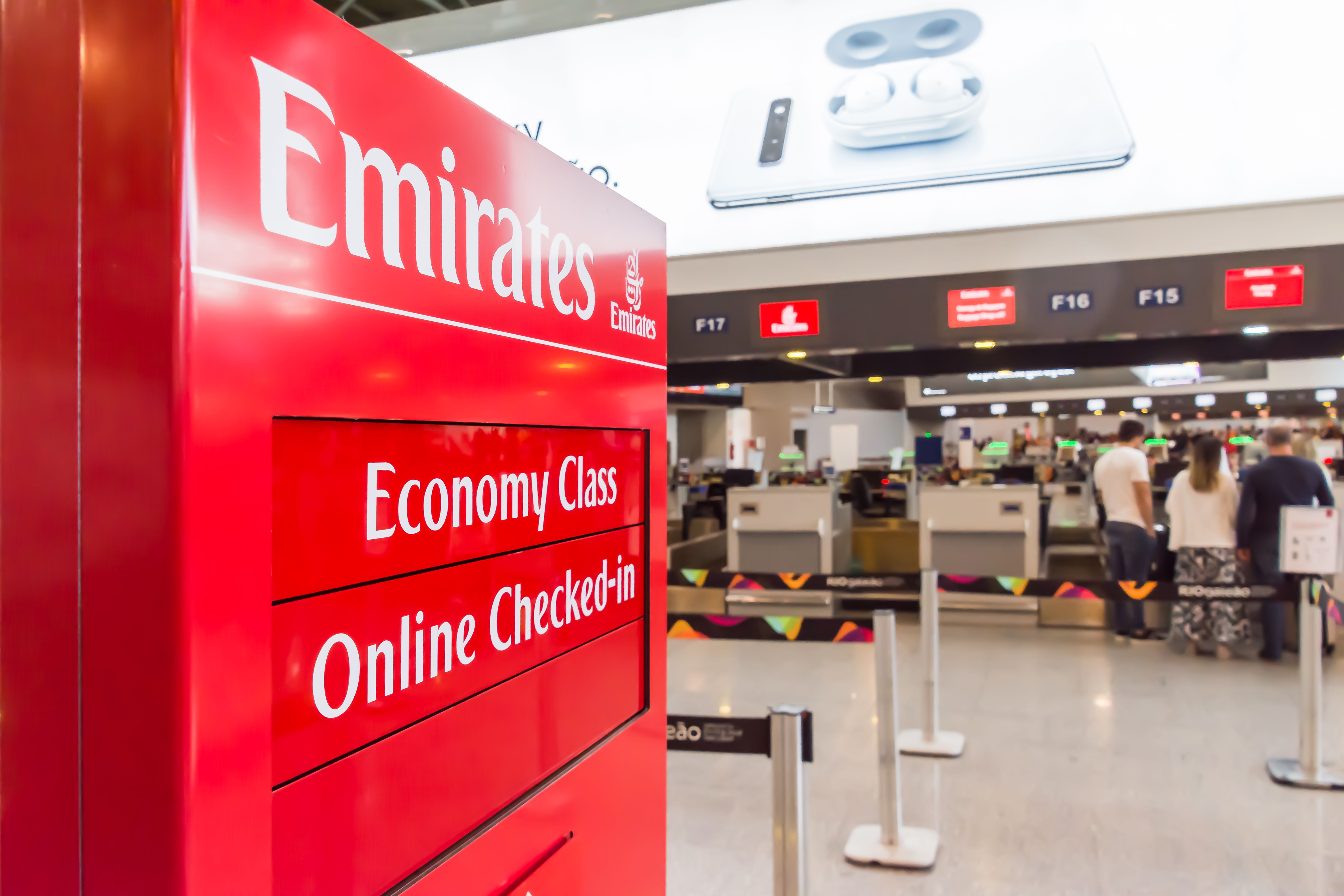 Emirates economy and online check-in counters.