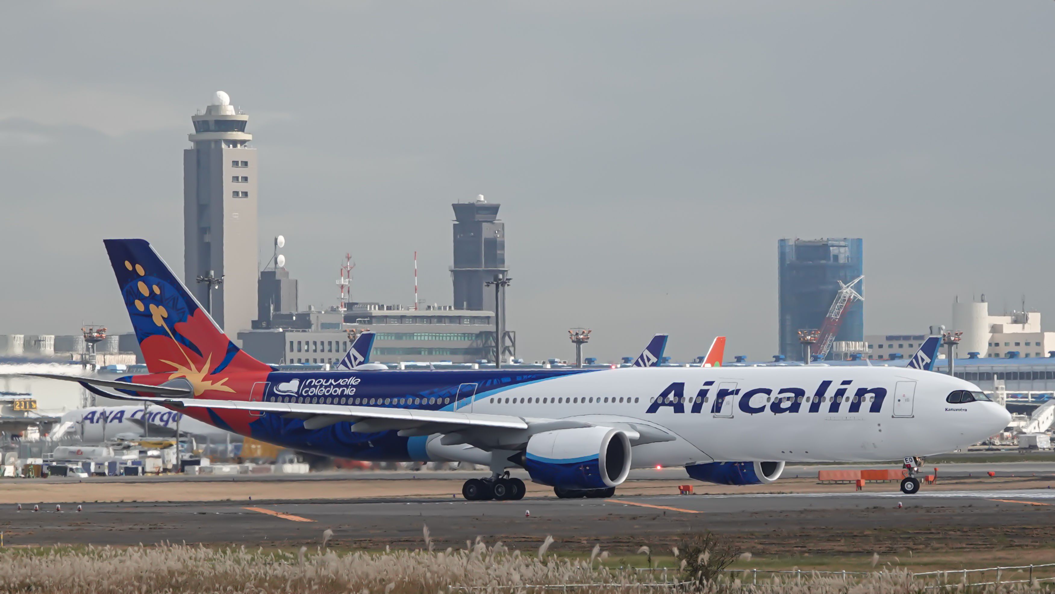 An Aircalin Airbus A330neo, registration F-ONEO, on the taxiway.