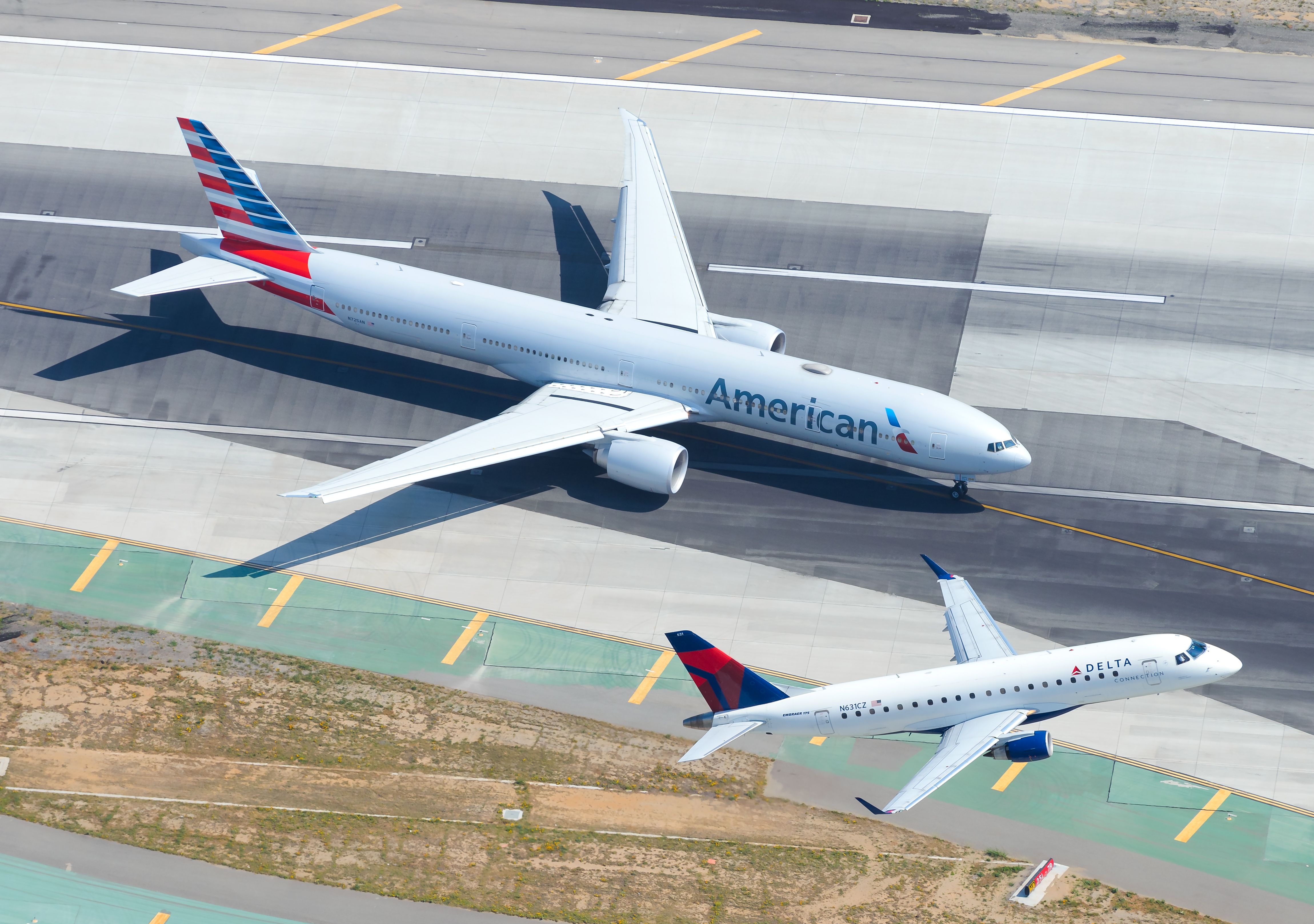 American Airlines Boeing 777-300ER & Delta Embraer E-Jet