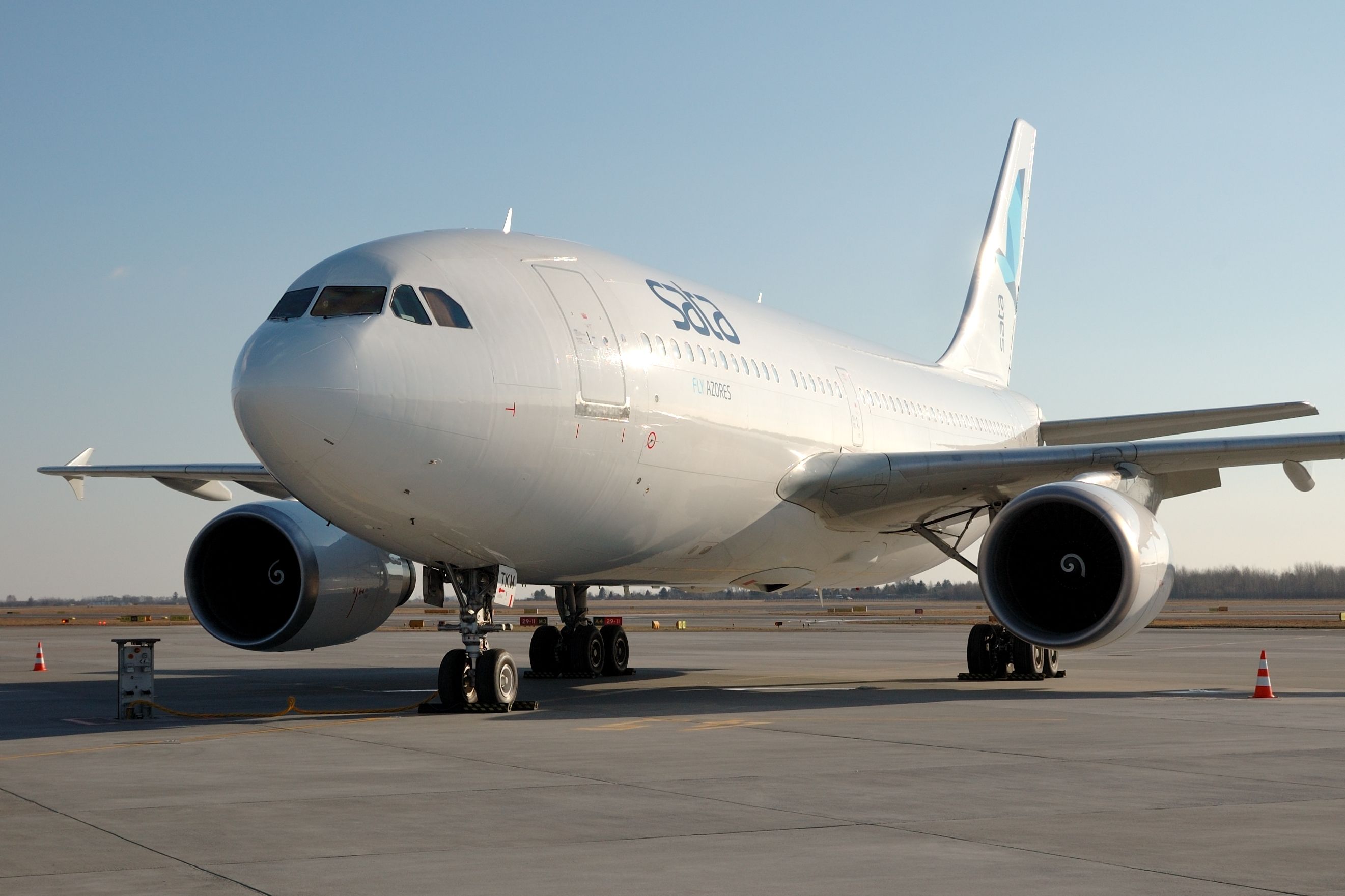 SATA Airbus A310 parked at an airfield.