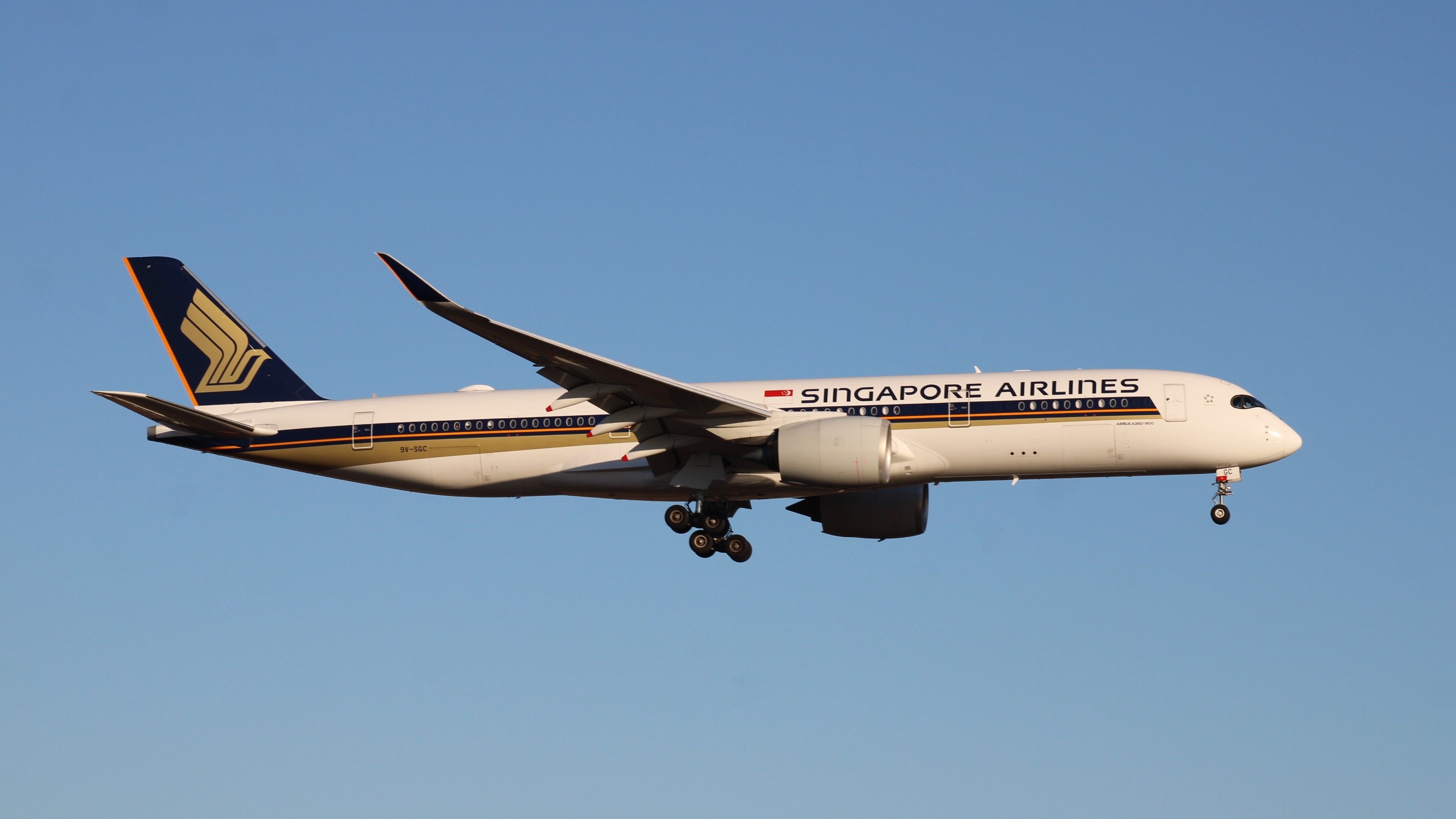 A Singapore Airlines Airbus A350-900ULR flying in the sky.
