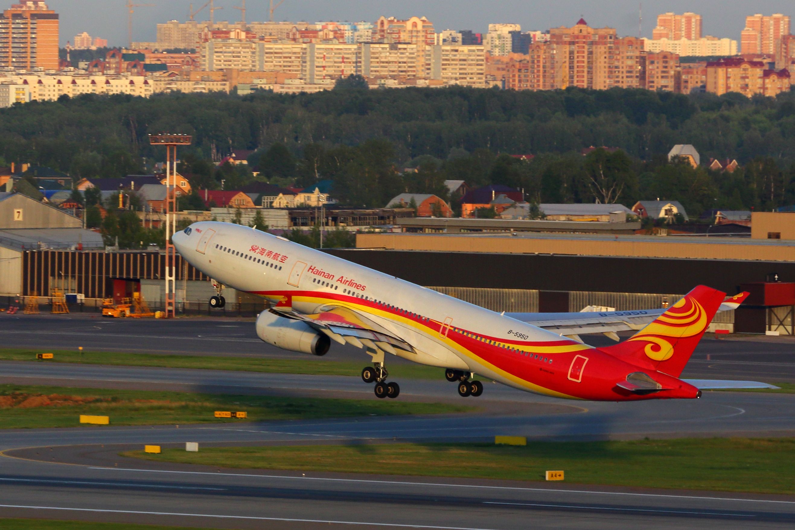 Hainan Airlines Airbus A330-300, registration B-5950, taking off.
