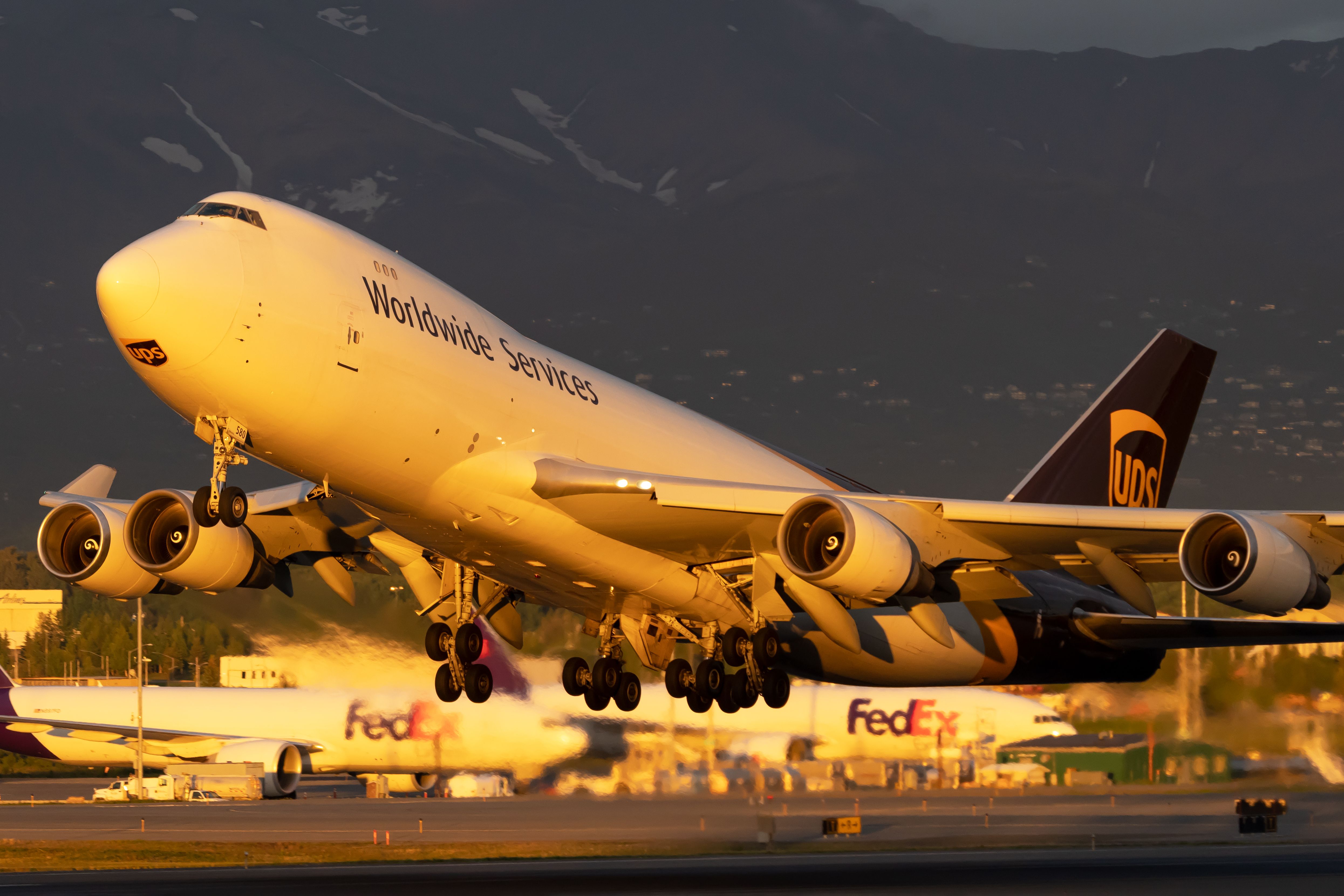 UPS Boeing 747-400F - at Anchorage International Airport with FedEx jets in background