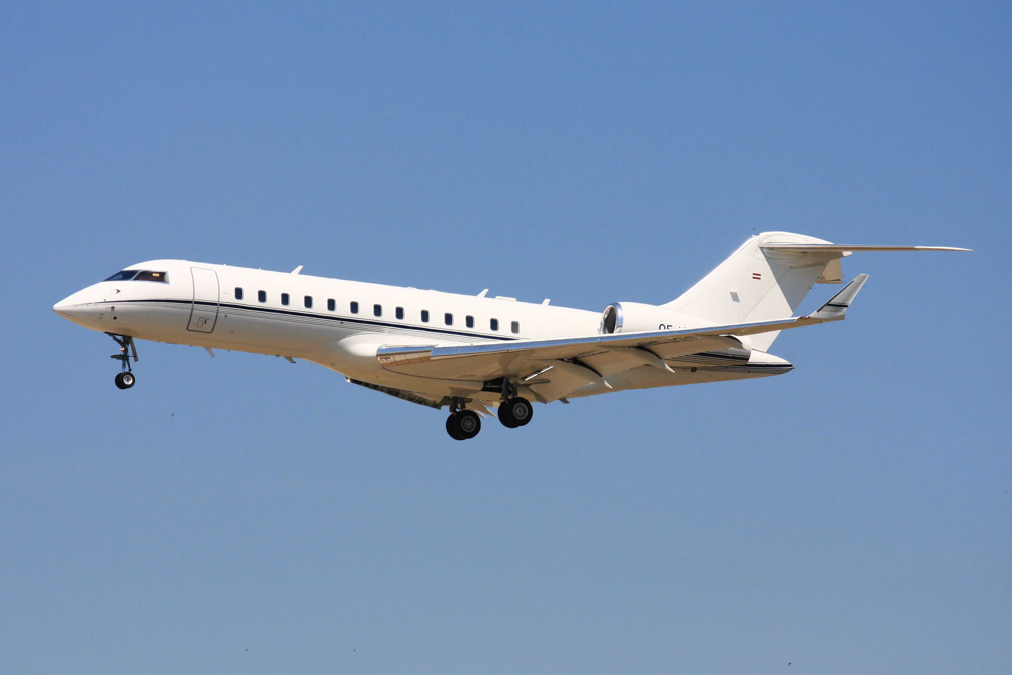 A Bombardier Global Express jet flying in the sky.