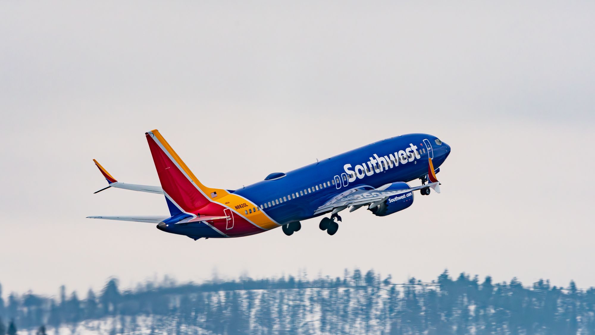 Southwest Airlines 737 MAX 8 Lifting Off Over GEG Snowy Foothills