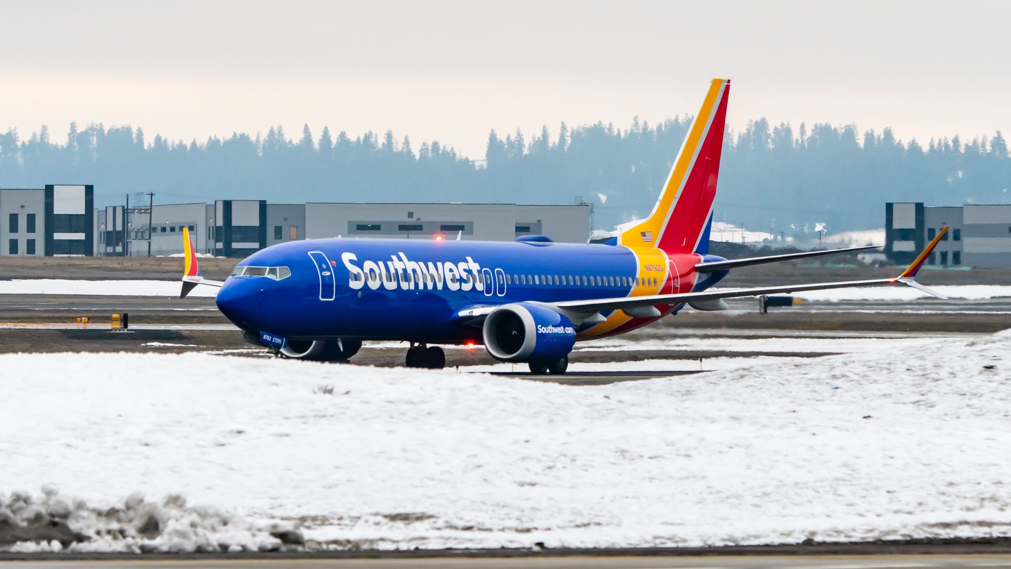 Southwest Airlines Boeing 737 MAX Behind GEG Snow Flashing Beacon