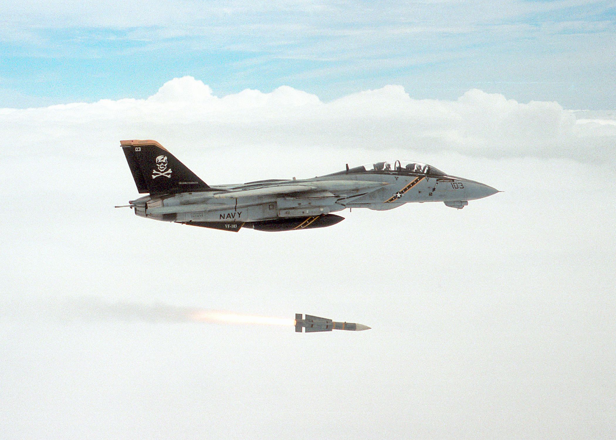 A Grumman F-14 Tomcat test fires a Phoenix air to air missile as part of an Annual Proficiency exercise.