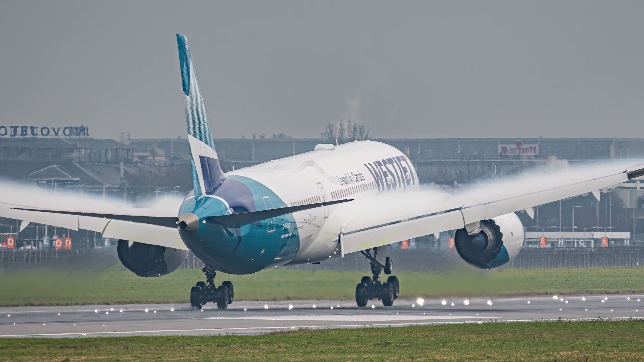 Westjet Boeing 787-9 with flaps down and lots of vapes 