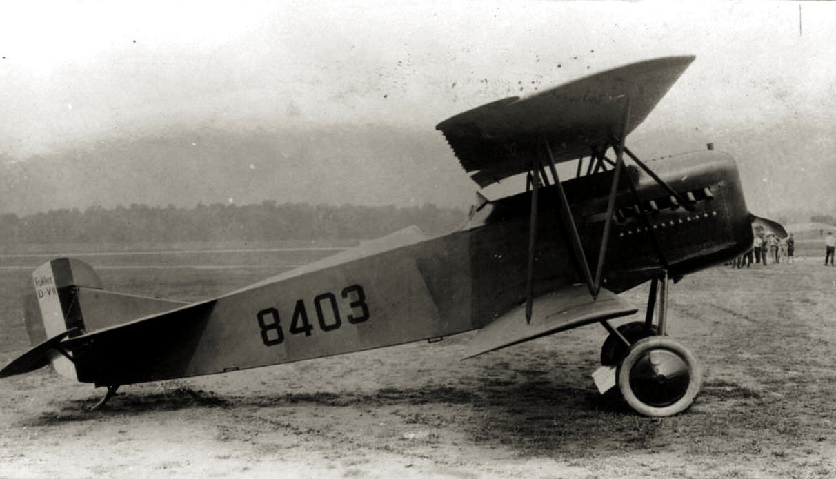 A black and white photo of an old Fokker plane.