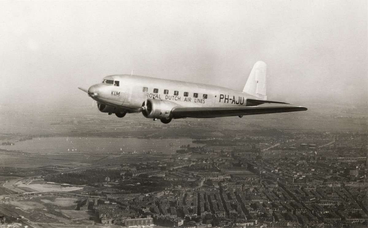 A Douglas DC-2 flying in the sky.