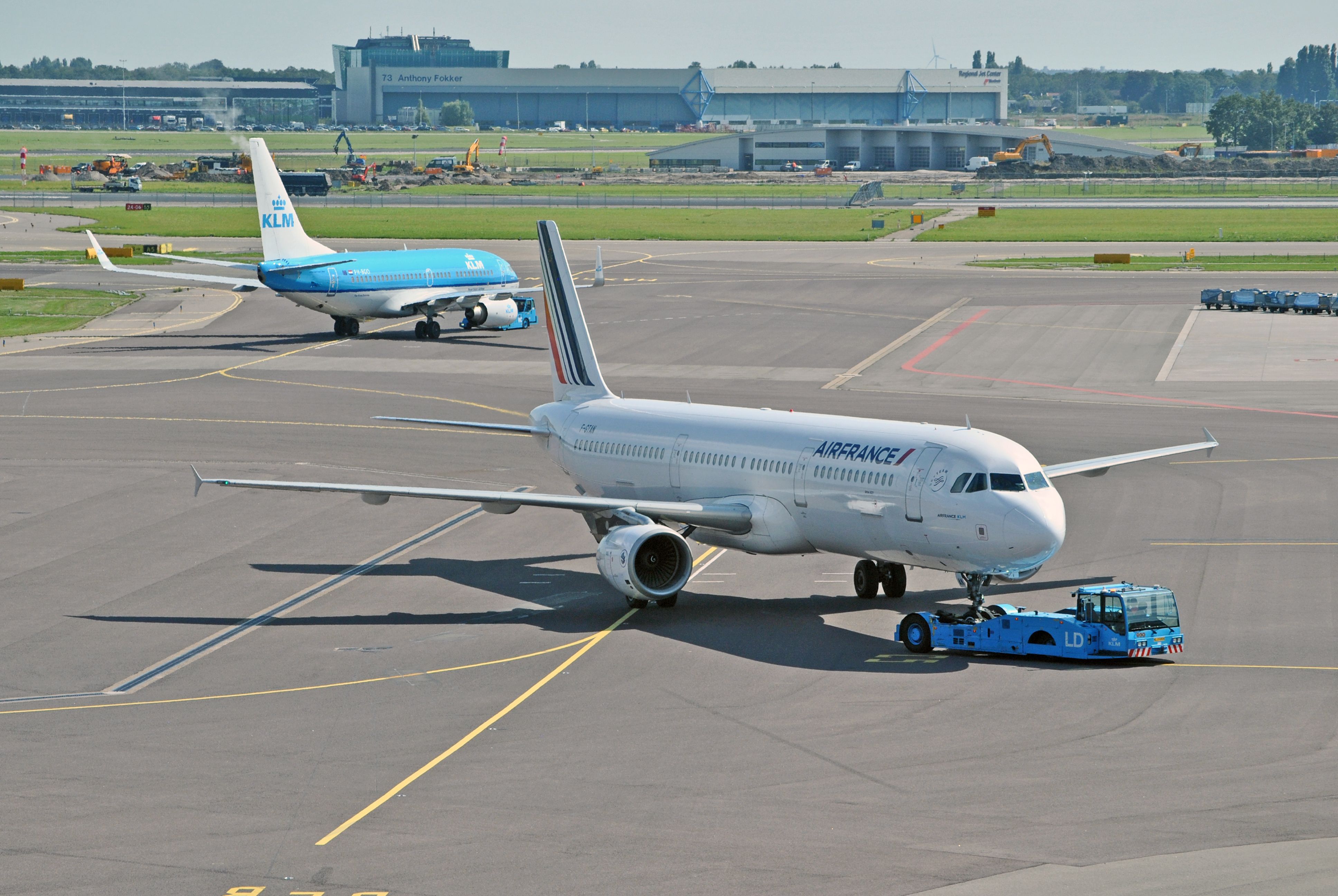 An Air France plane taxiing in front of a KLM aircraft in Amsterdam 