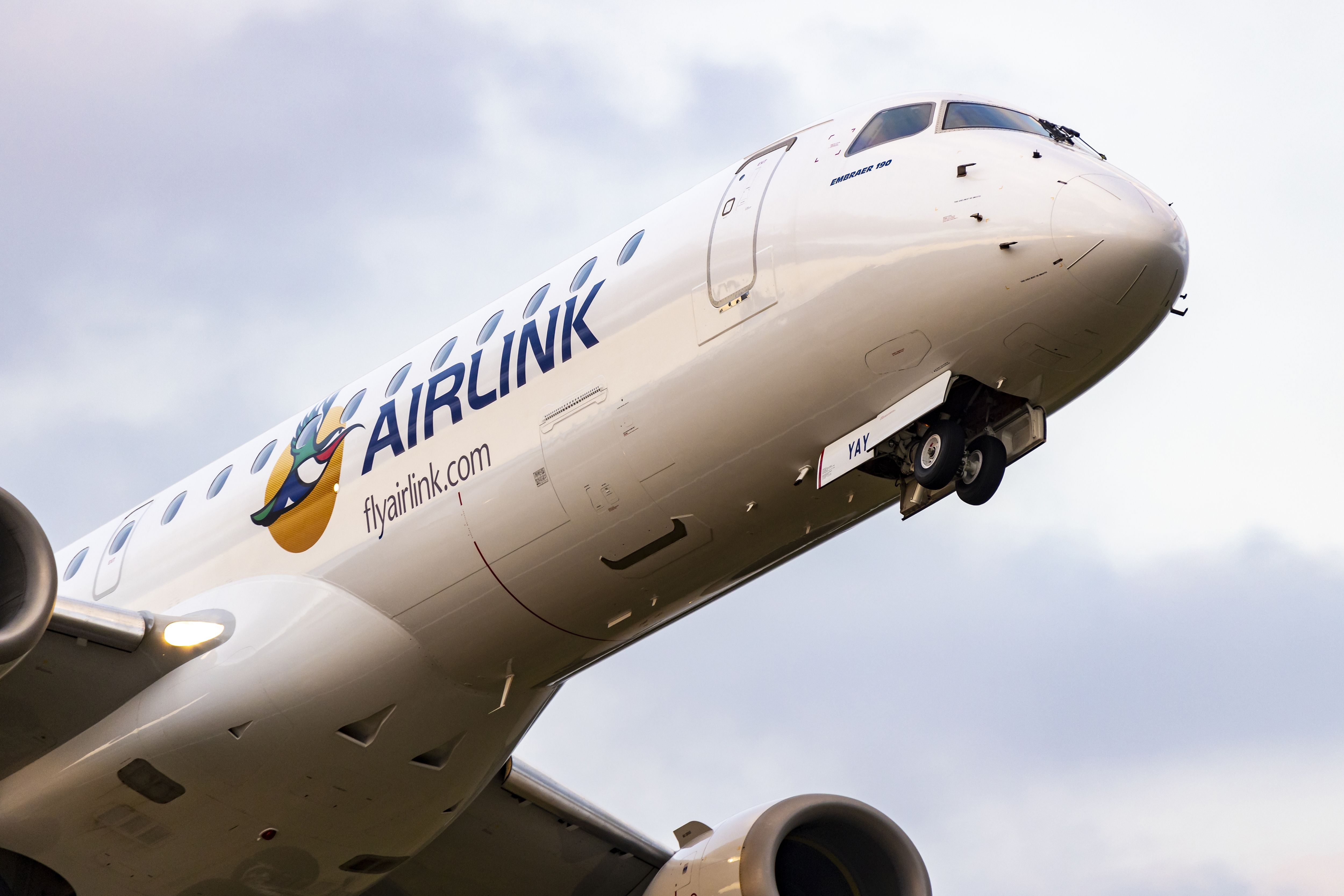 An Airlink aircraft flying over Nelspruit in South Africa 