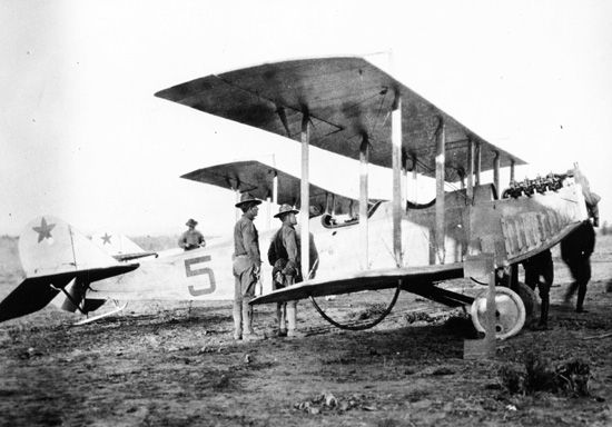 A Curtiss JN-3 aircraft on the ground.