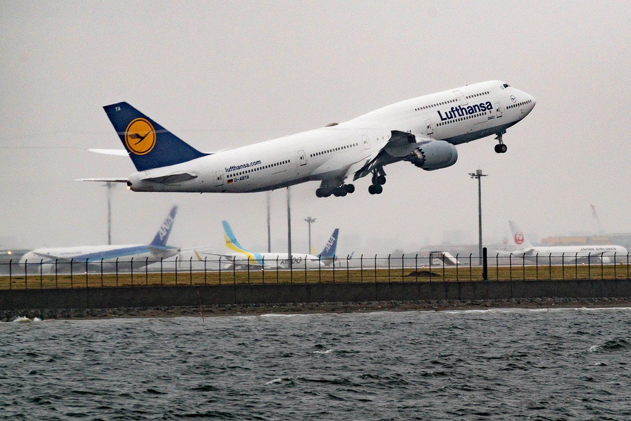 A Lufthansa Boeing 747-8 taking off at Haneda Airport.
