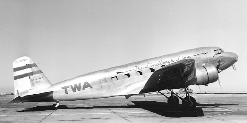 A TWA Douglas DC-2 parked at an airfield.