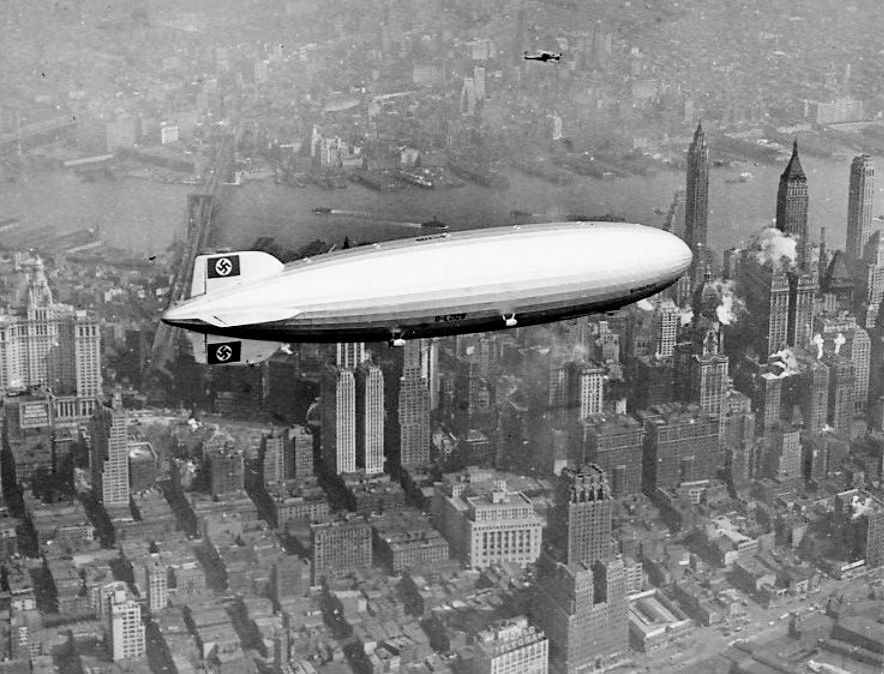 The Hindenburg flies over New York.
