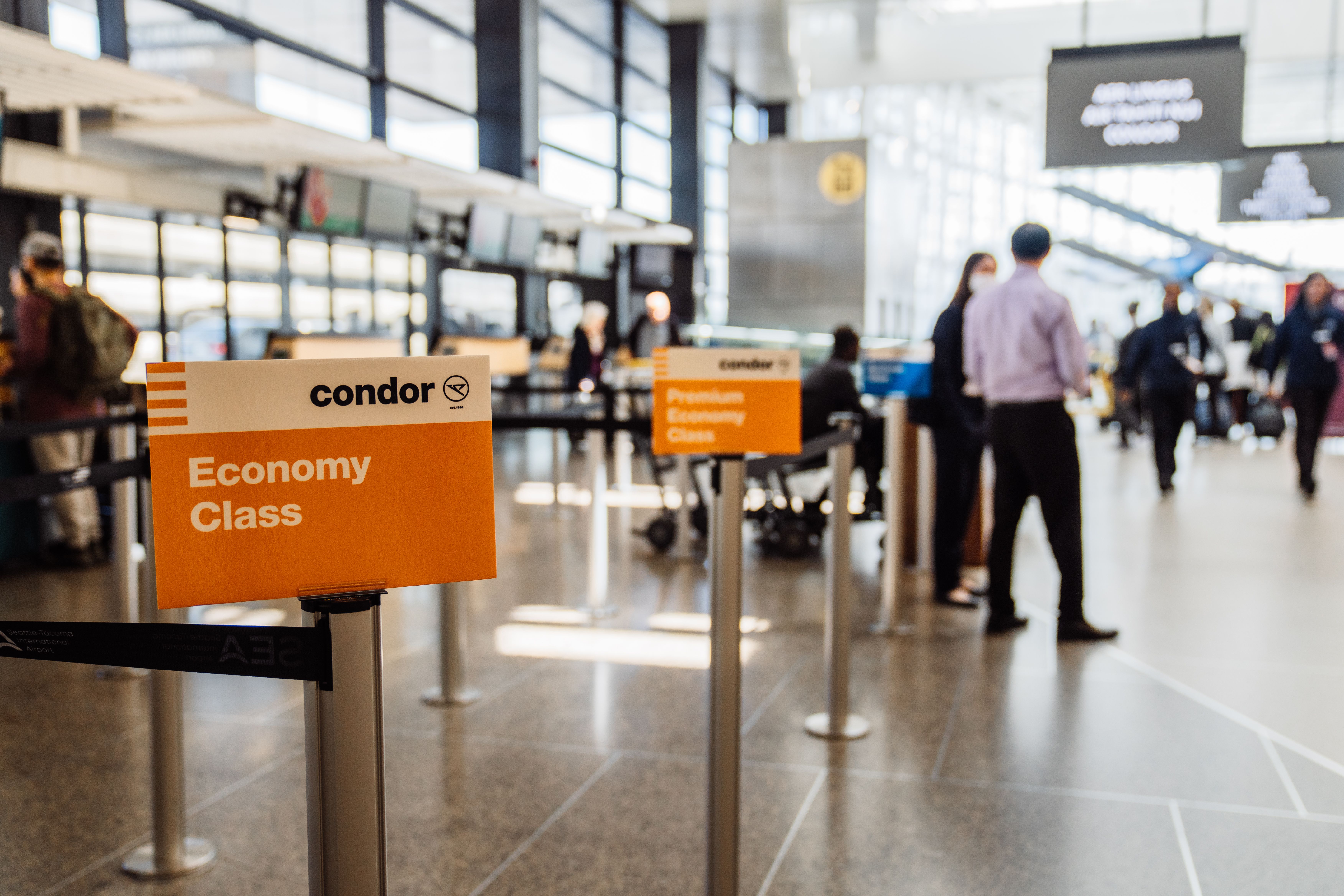 Condor economy check in sign