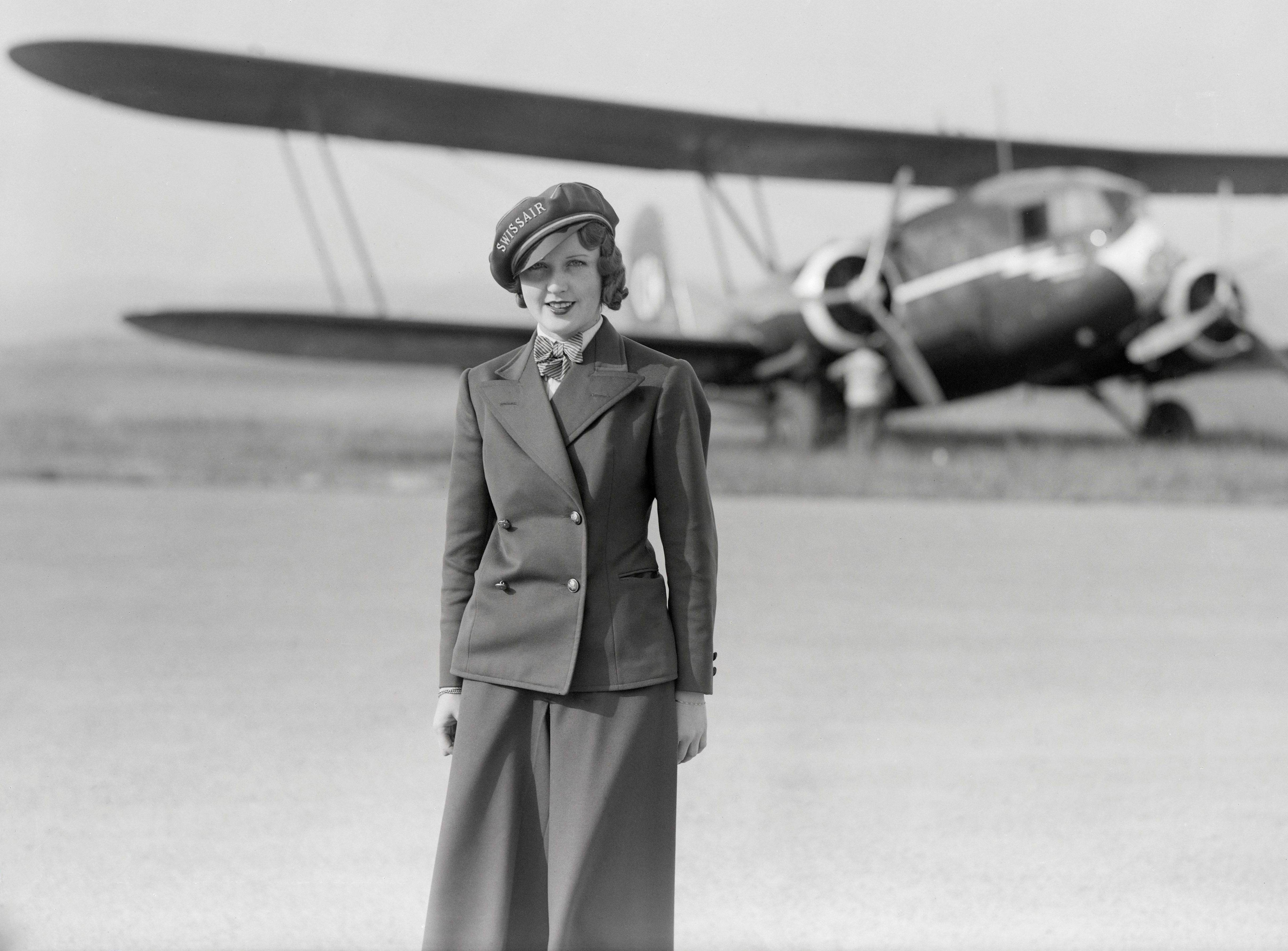 Nelly Diener in front of her Curtis Condor aircraft.