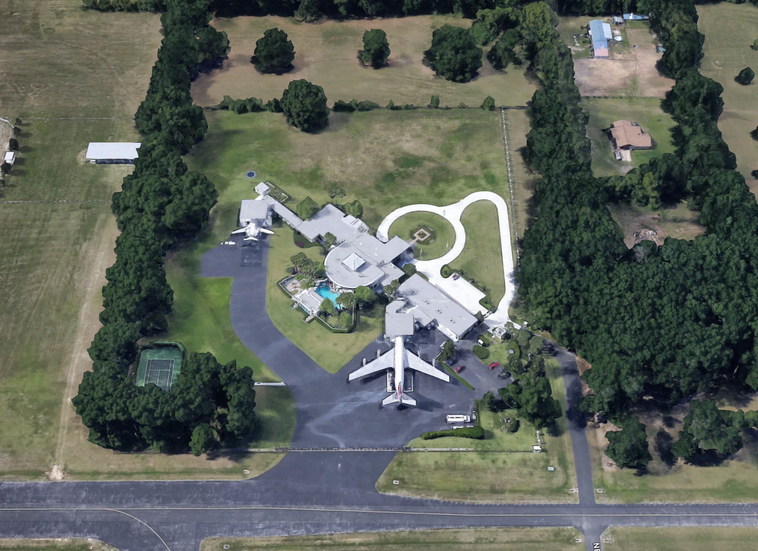 An aerial view of John travolta's house in Florida.