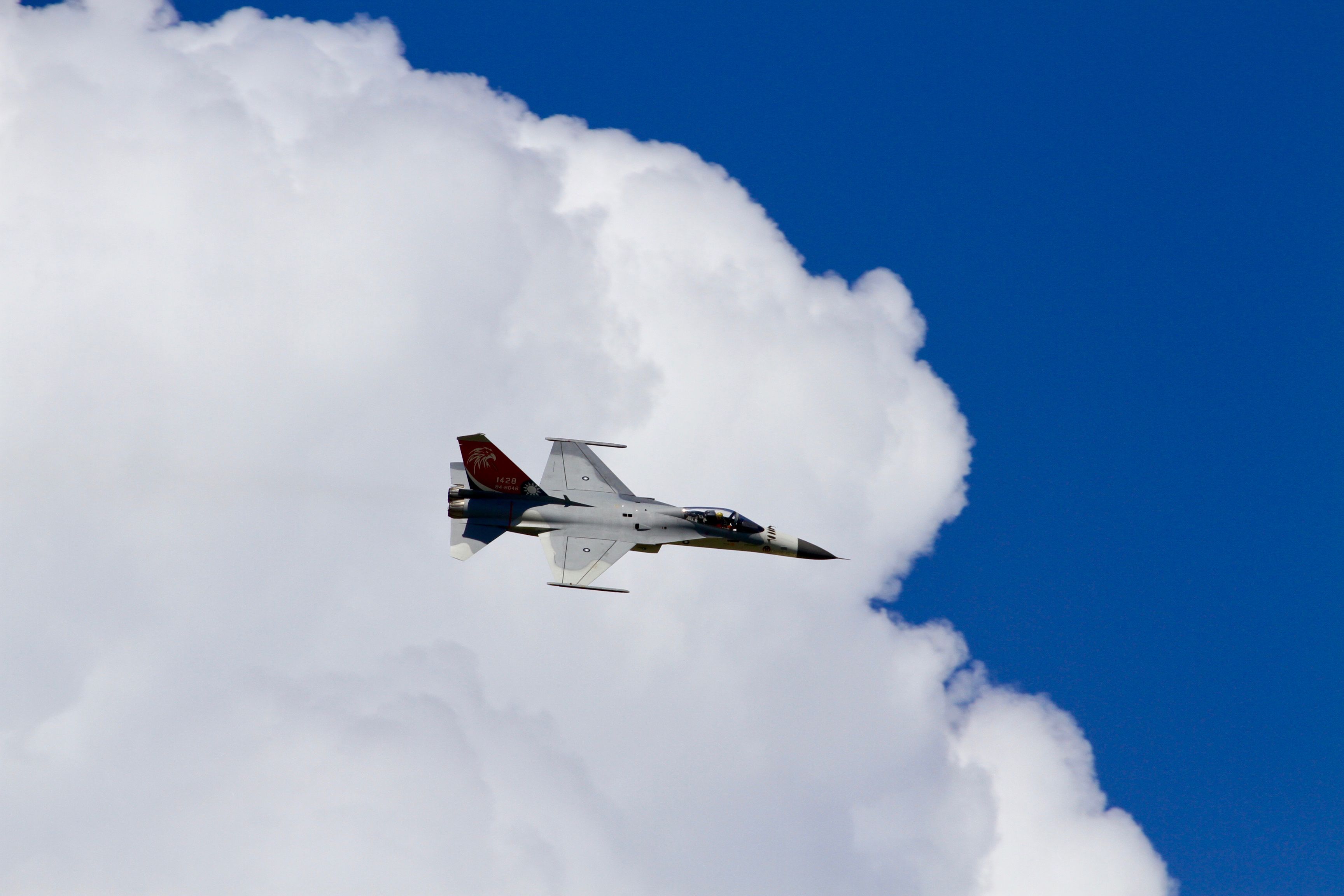 A F-CK-1 fighter flying above the Hualien Republic of China Air Force (ROCAF) Base.