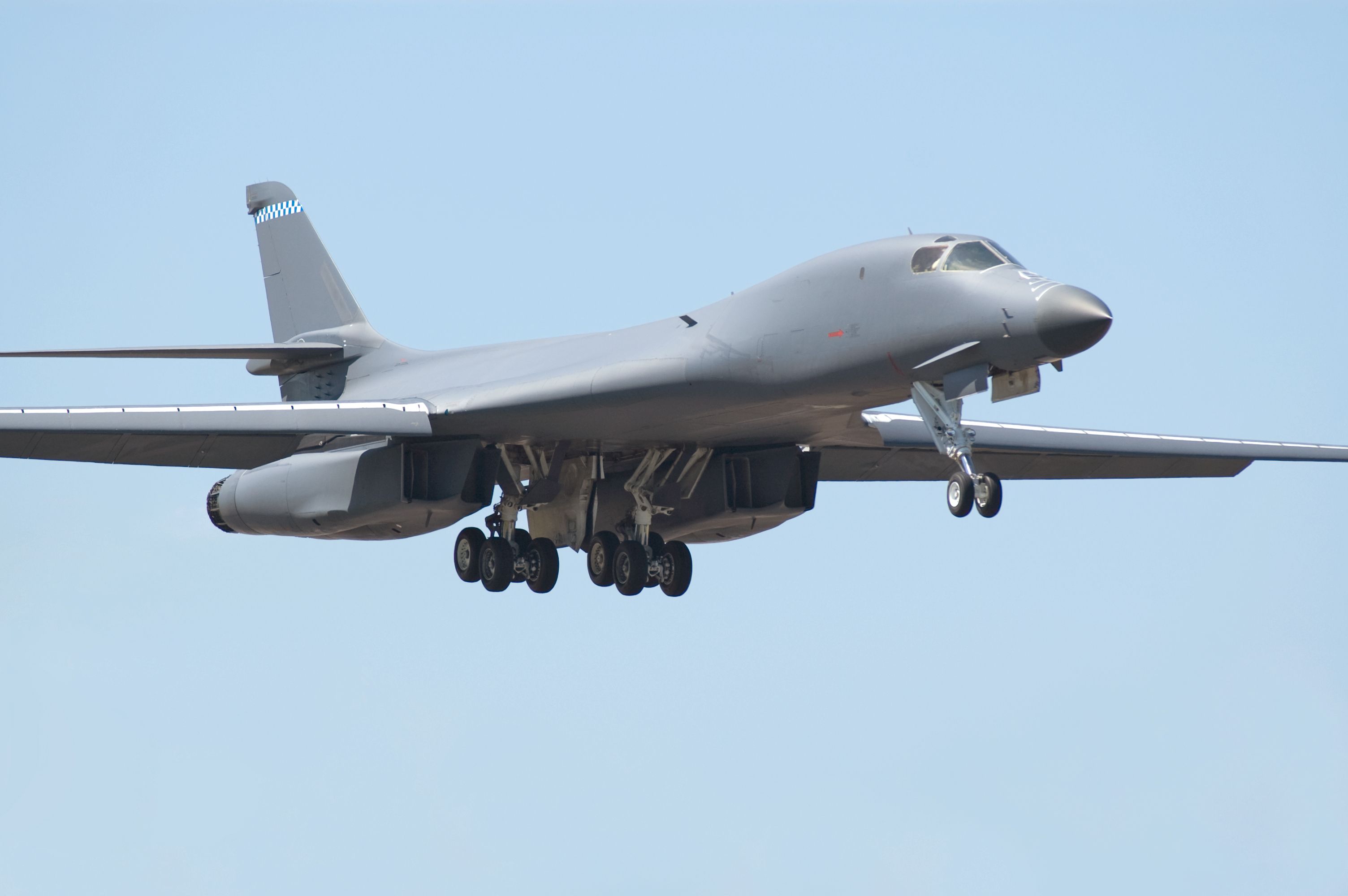 A Rockwell B-1 Lancer flying in the sky.