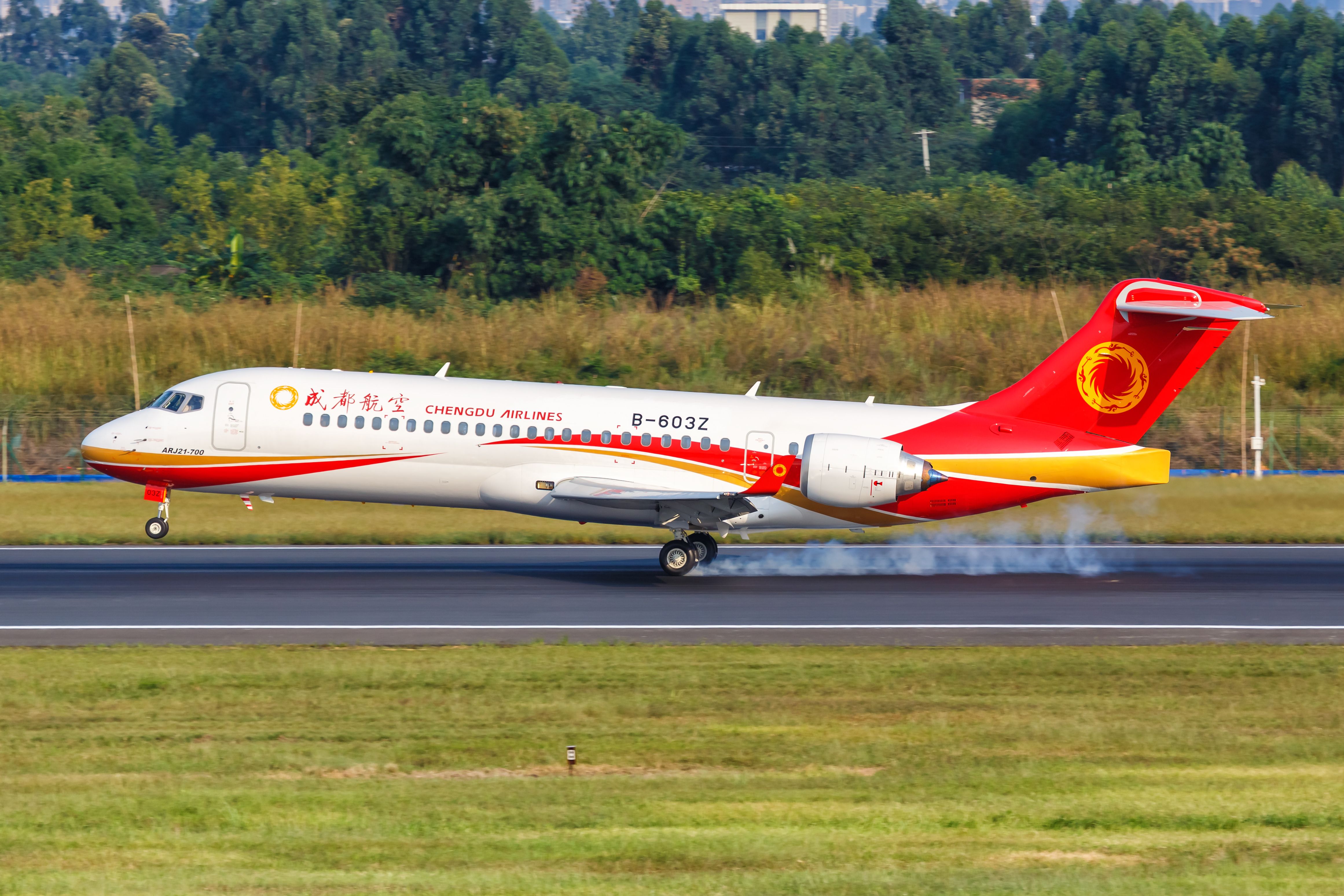 A Chengdu Airlines COMAC ARJ21-700 as it lands on the runway.
