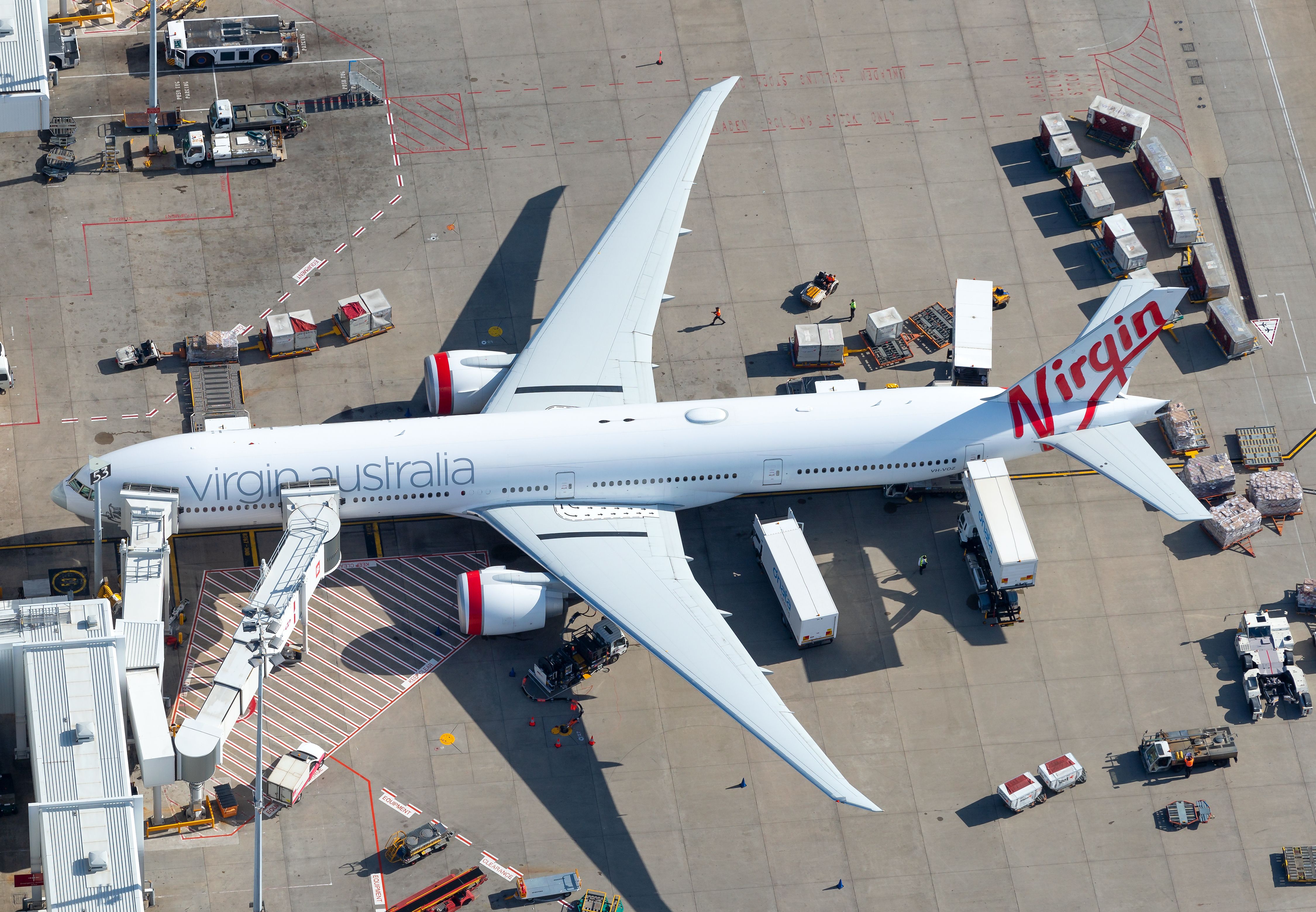 March 25 2018: Virgin Australia Boeing 777 aerial view at Sydney International Airport. Aircraft registered as VH-VOZ. Australian airline in debt entering voluntary administration