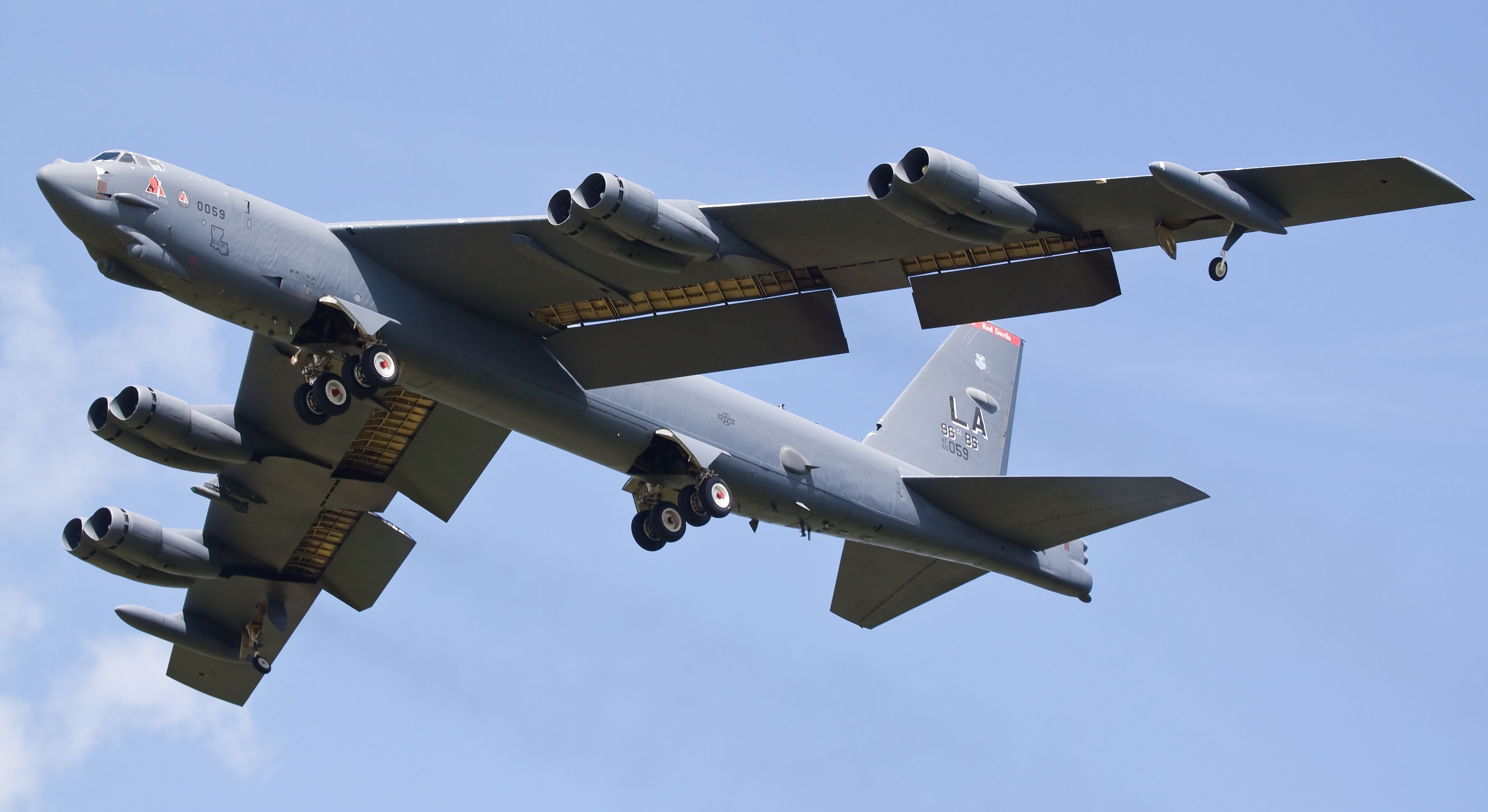 A Boeing B-52 Stratofortess flying in the sky.