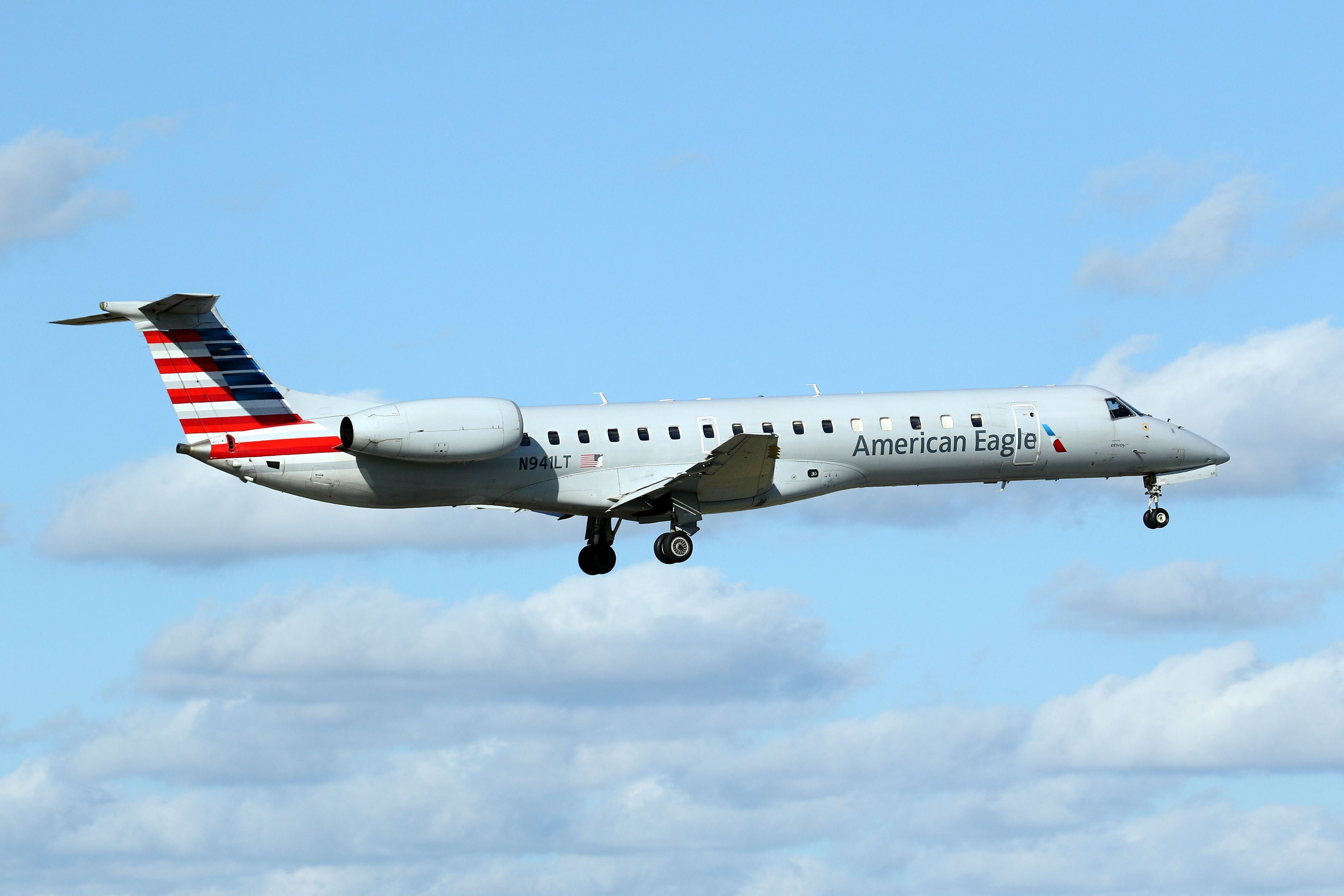 American Eagle (Envoy Air) Embraer ERJ-145 landing at Miami International Airport.