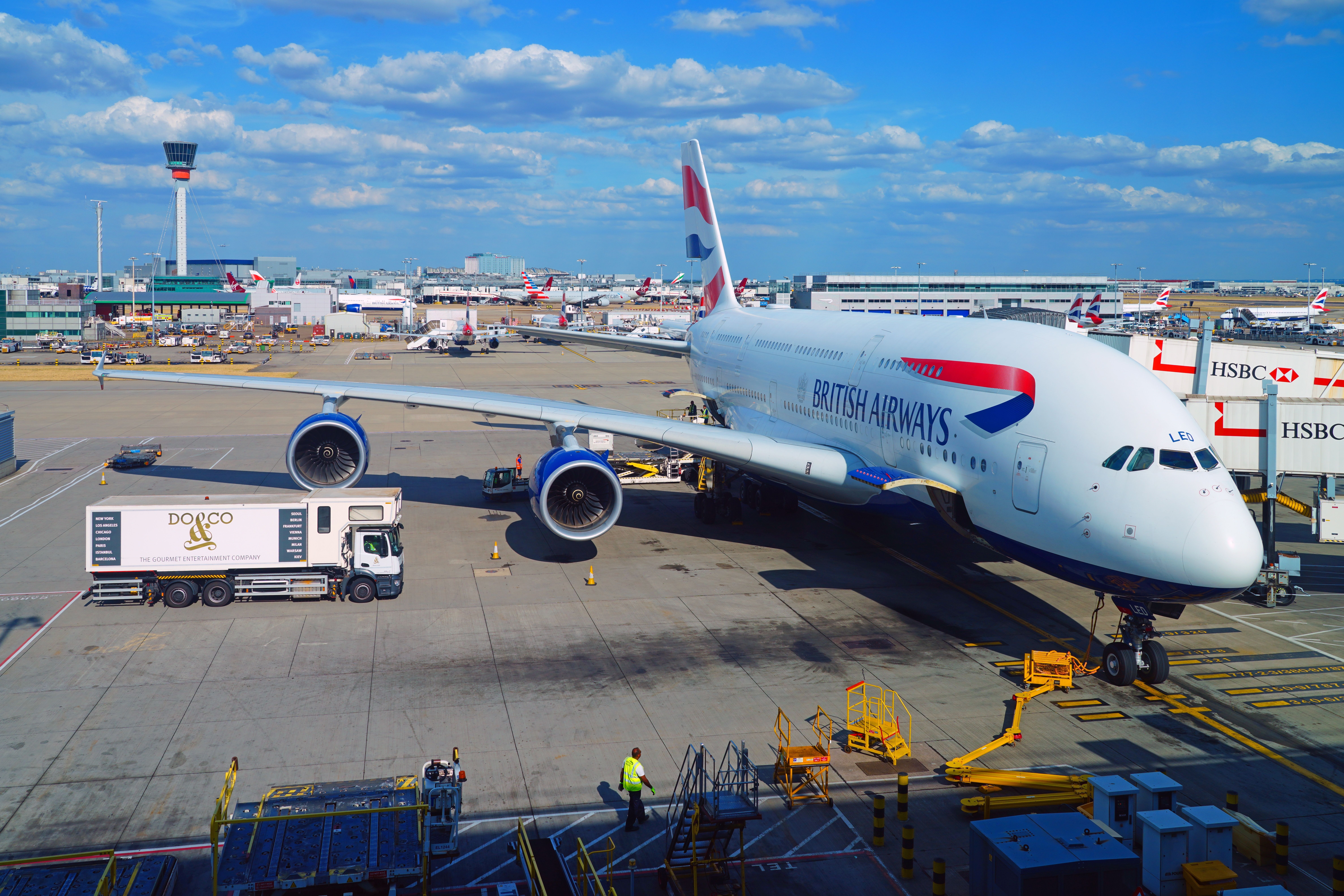 A British Airways Airbus A380 parked at the gate.