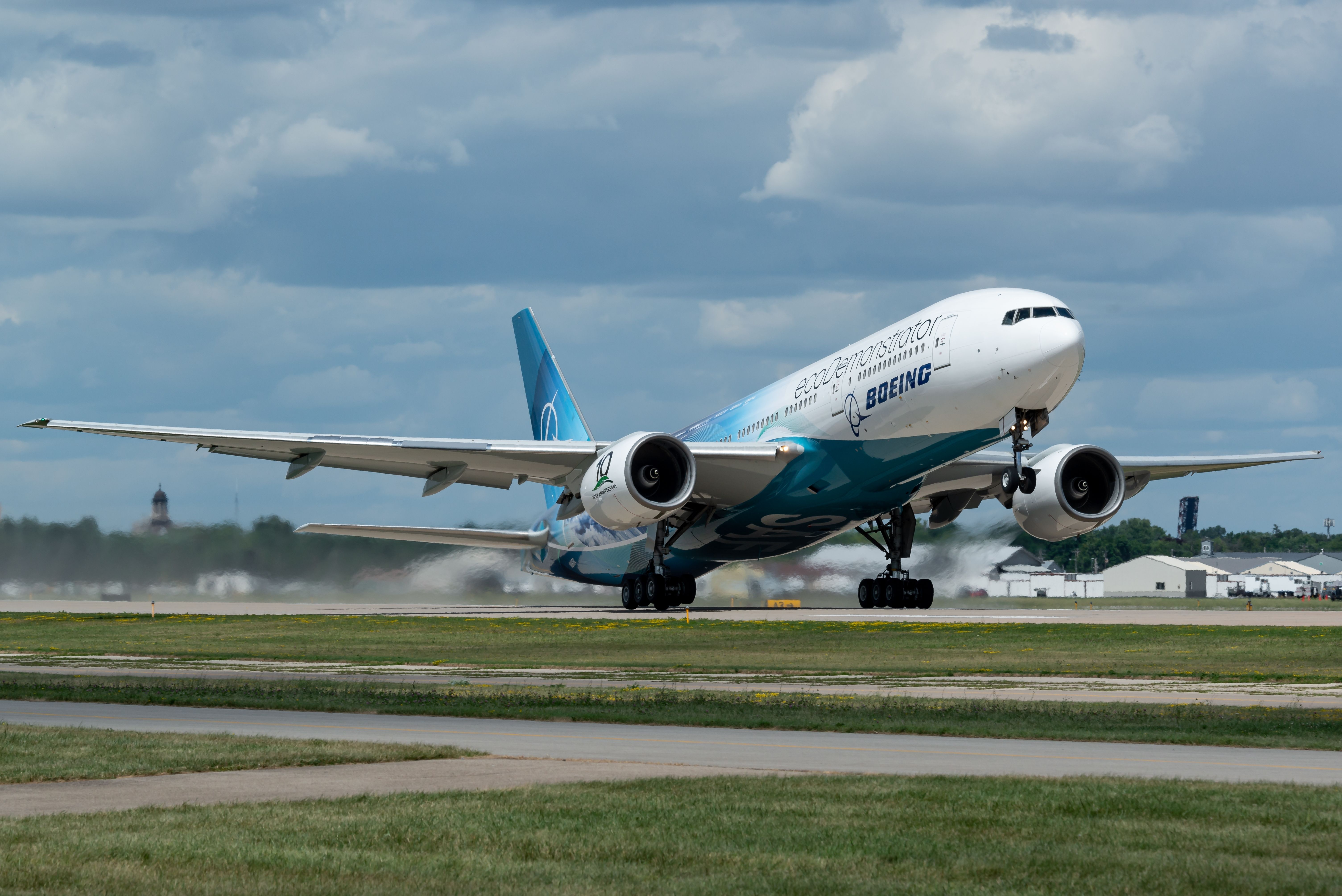 Oshkosh Wittman airport Wisconsin USA - 07 28 2022: Boeing 777-200 ecoDemonstrator during take off for its display, flying with sustainable aviation fuel (SAF) at air venture 2022 airshow in Oshkosh