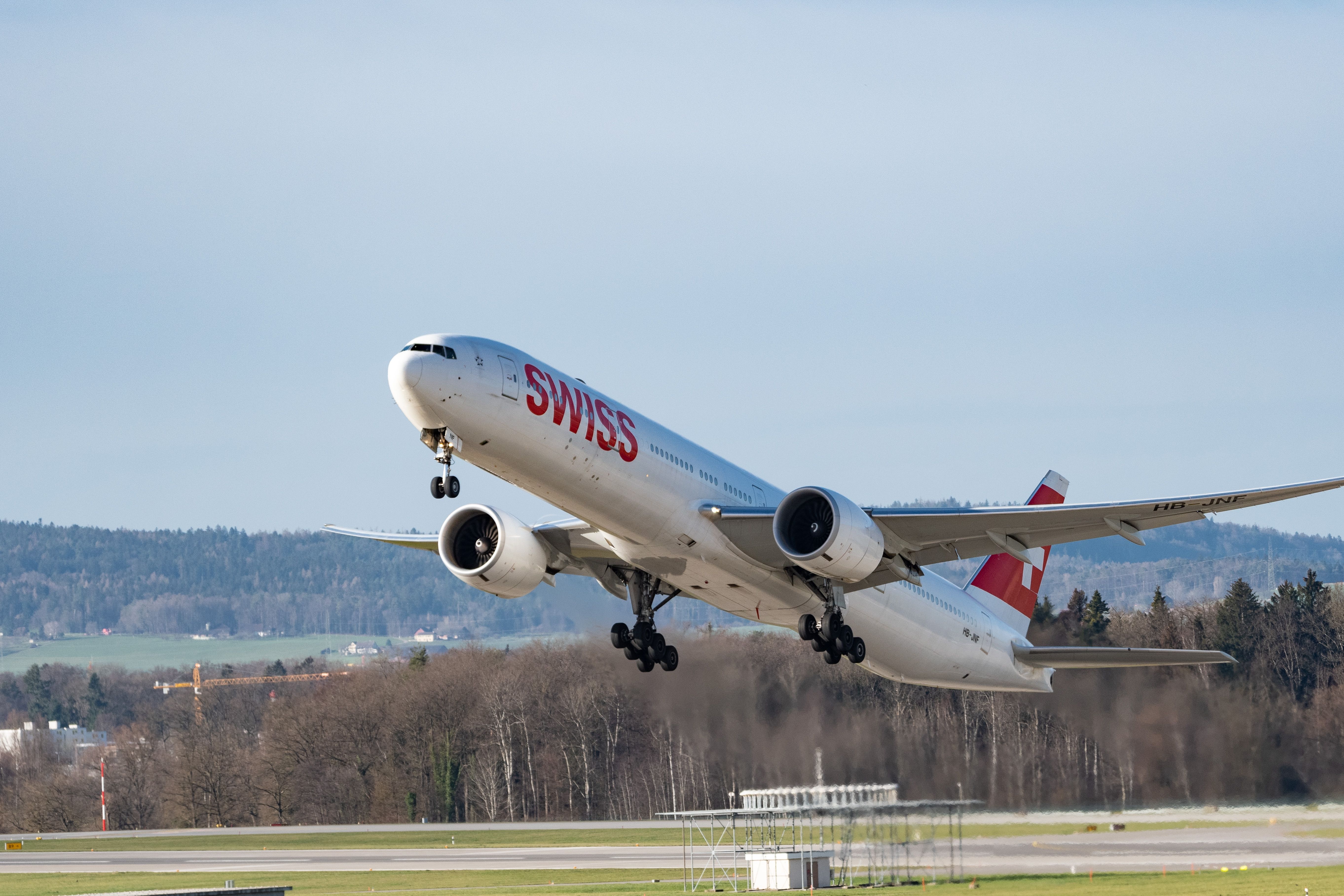 A SWISS Boeing 777 just after takeoff. 