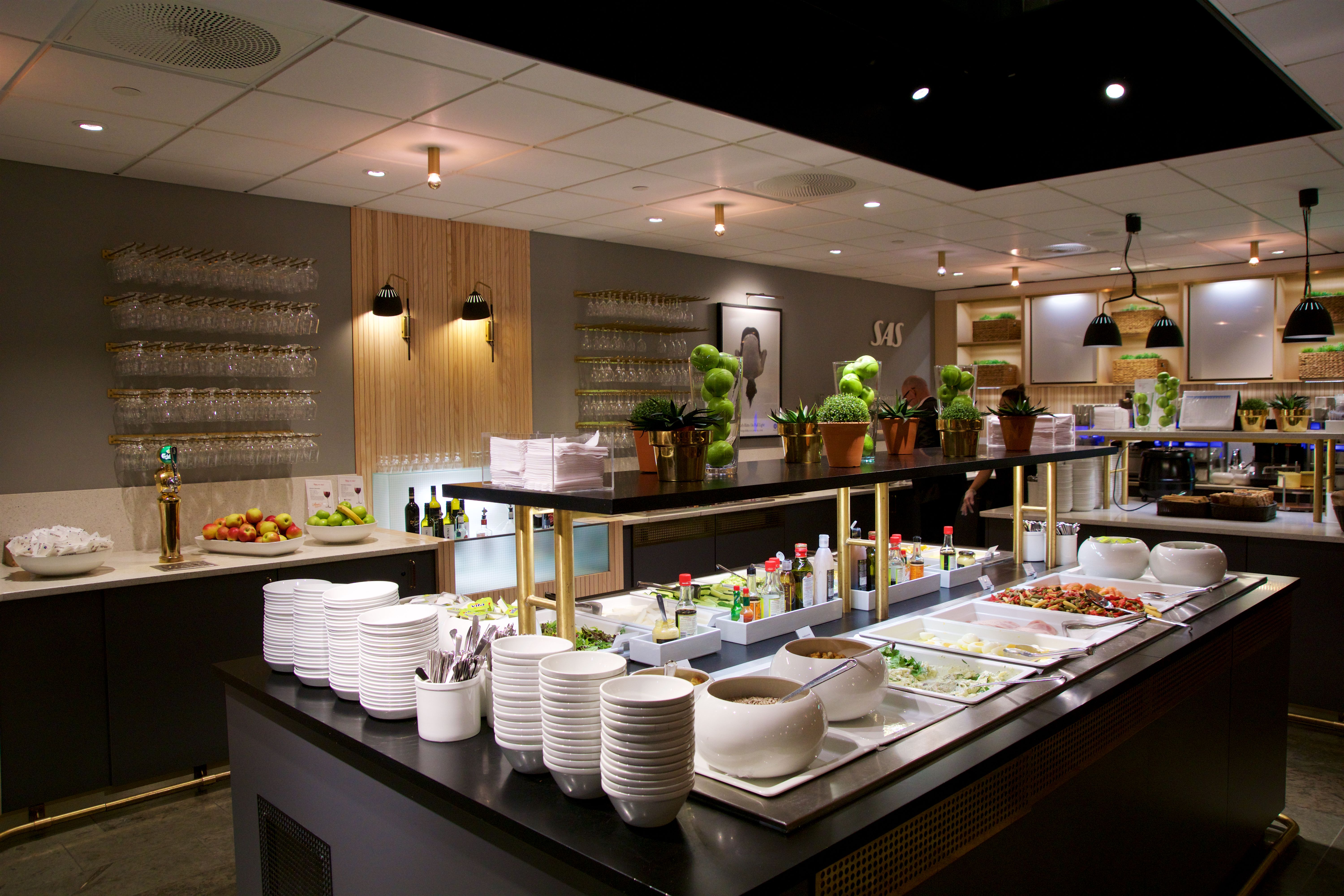 Food options inside of a business class lounge in Oslo. 
