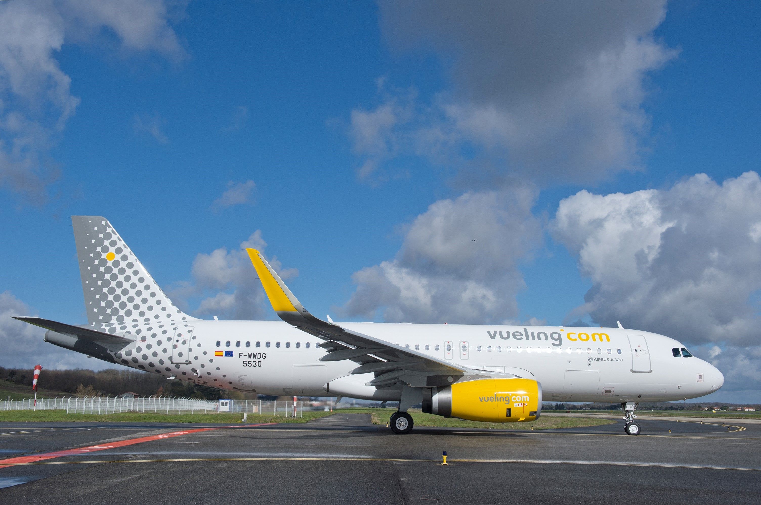 A Vueling Airbus A320 Taxiing to the runway.