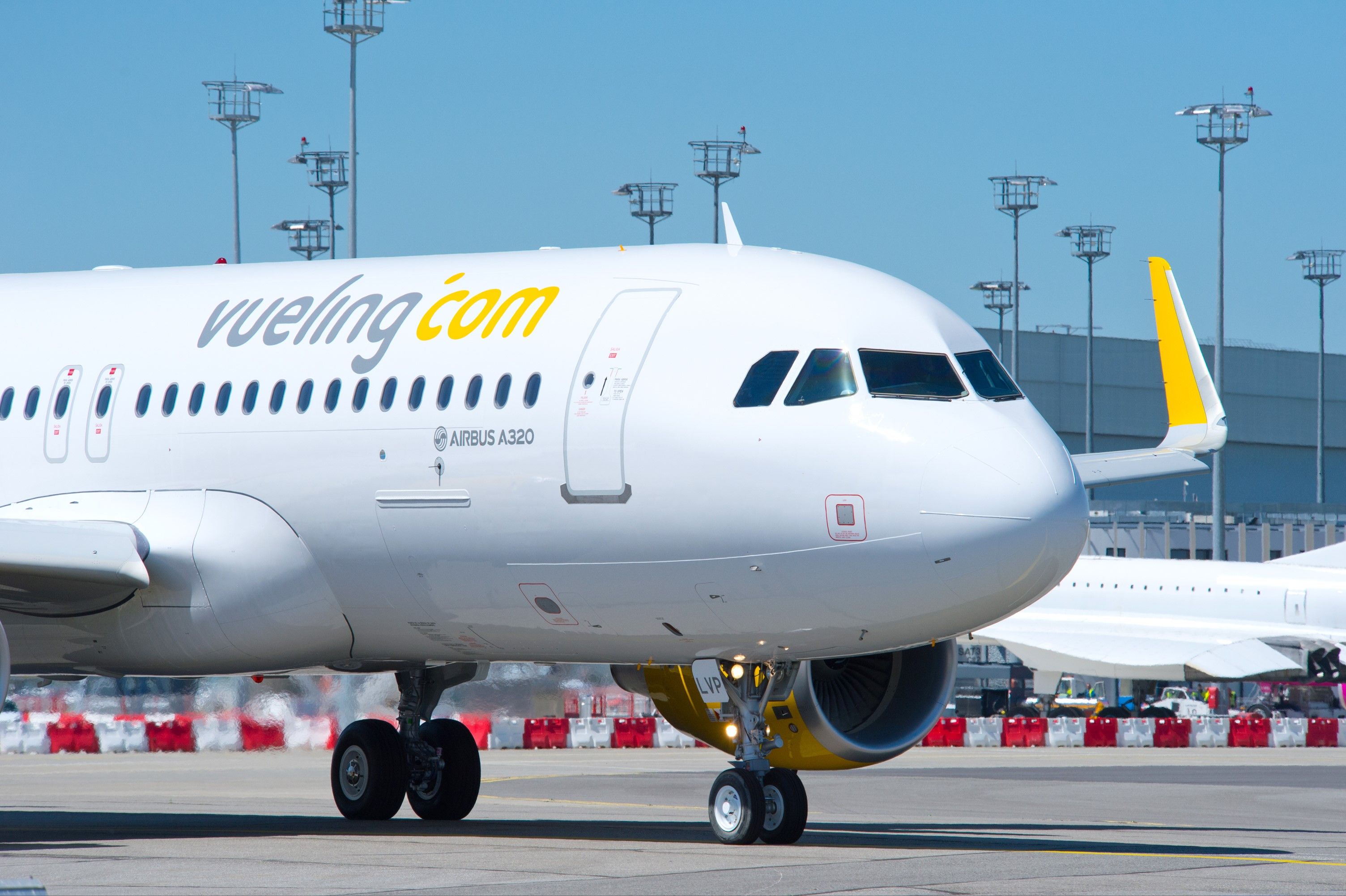 A Vueling Airbus A320 Taxiing to the runway.