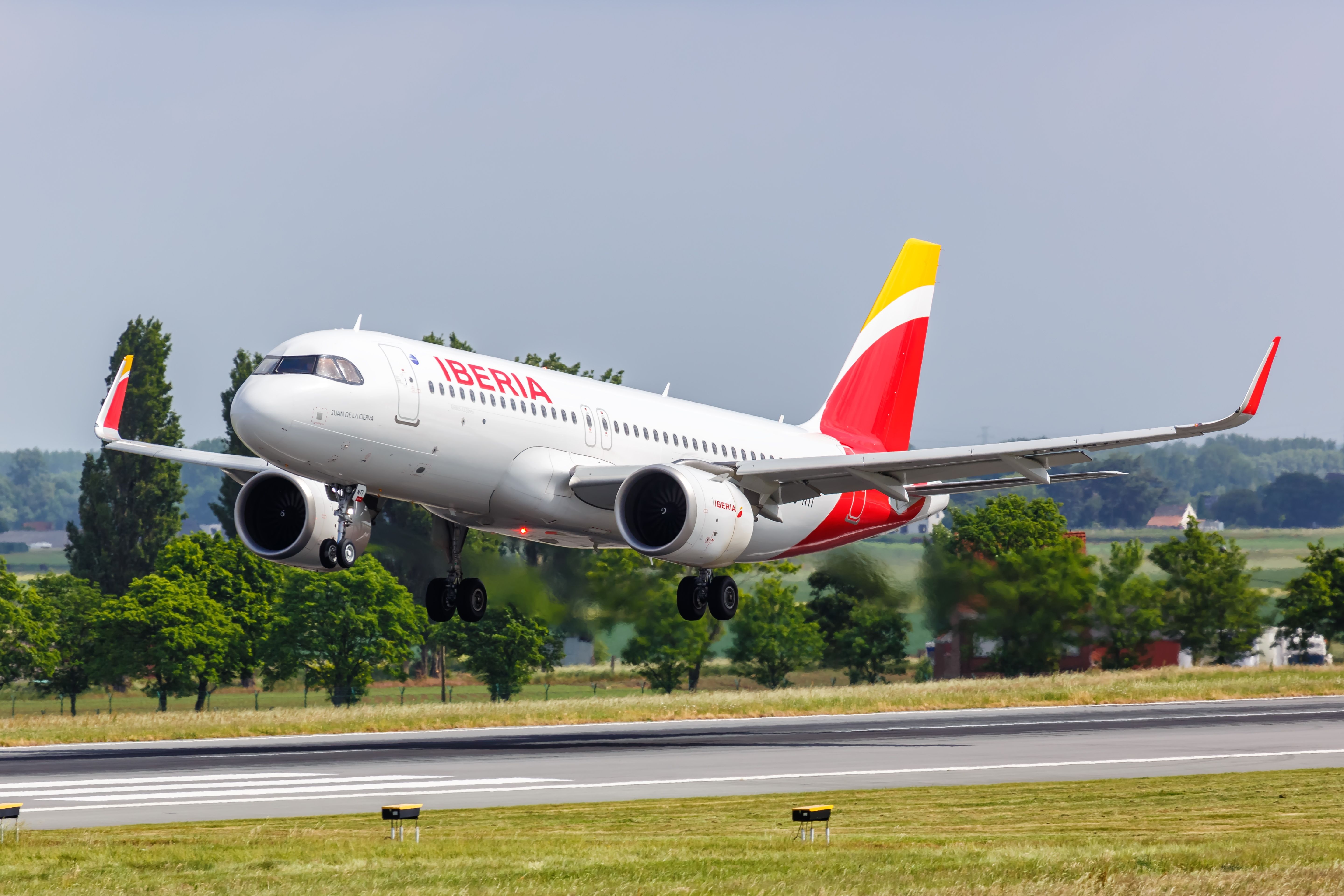 An Iberia Airbus A320neo taking off from Brussels.