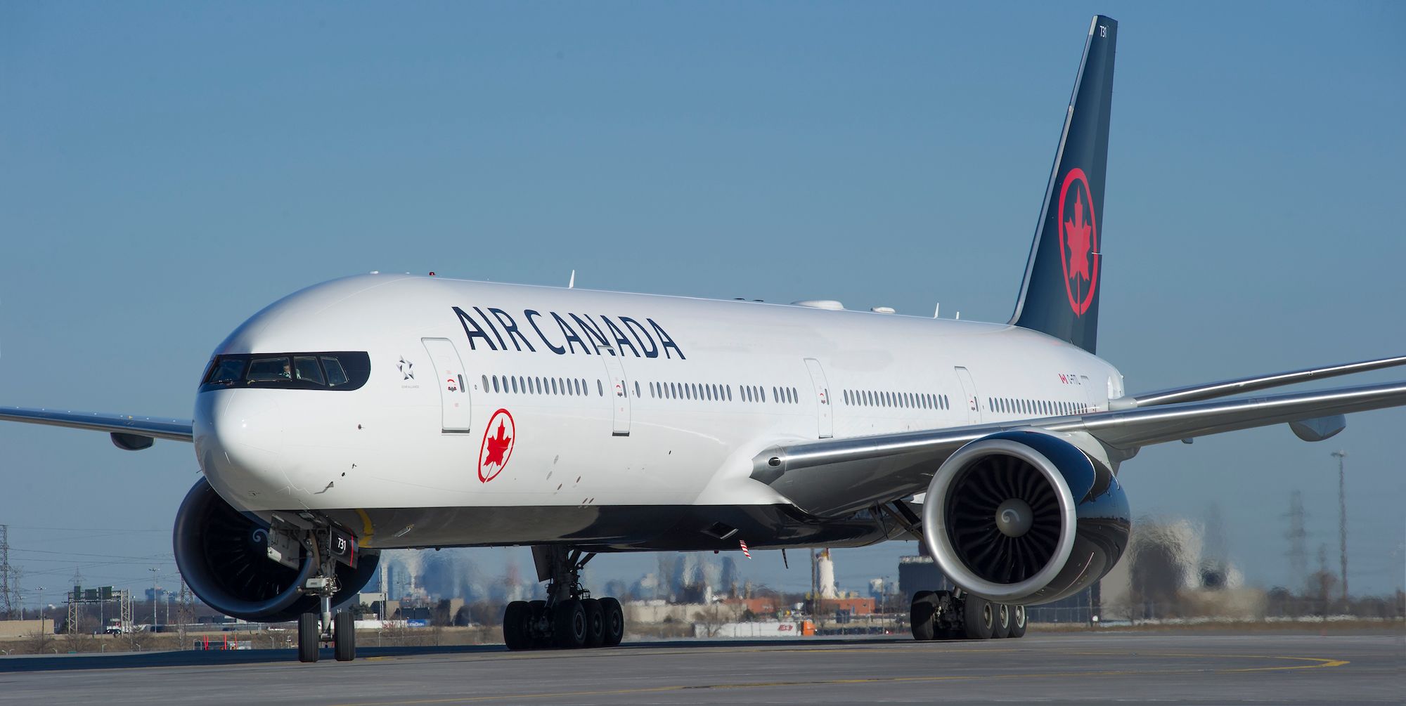 Air Canada's Boeing 777-300ER lands on the ground