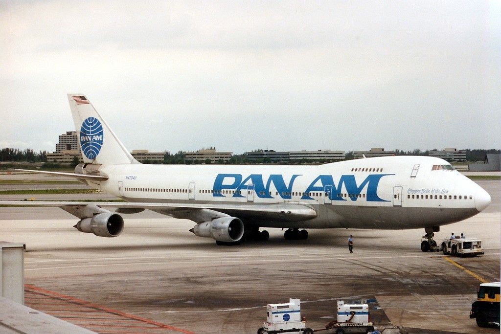 A Pan American World Airways Boeing 747-122 being pushed back on an aircraft apron.