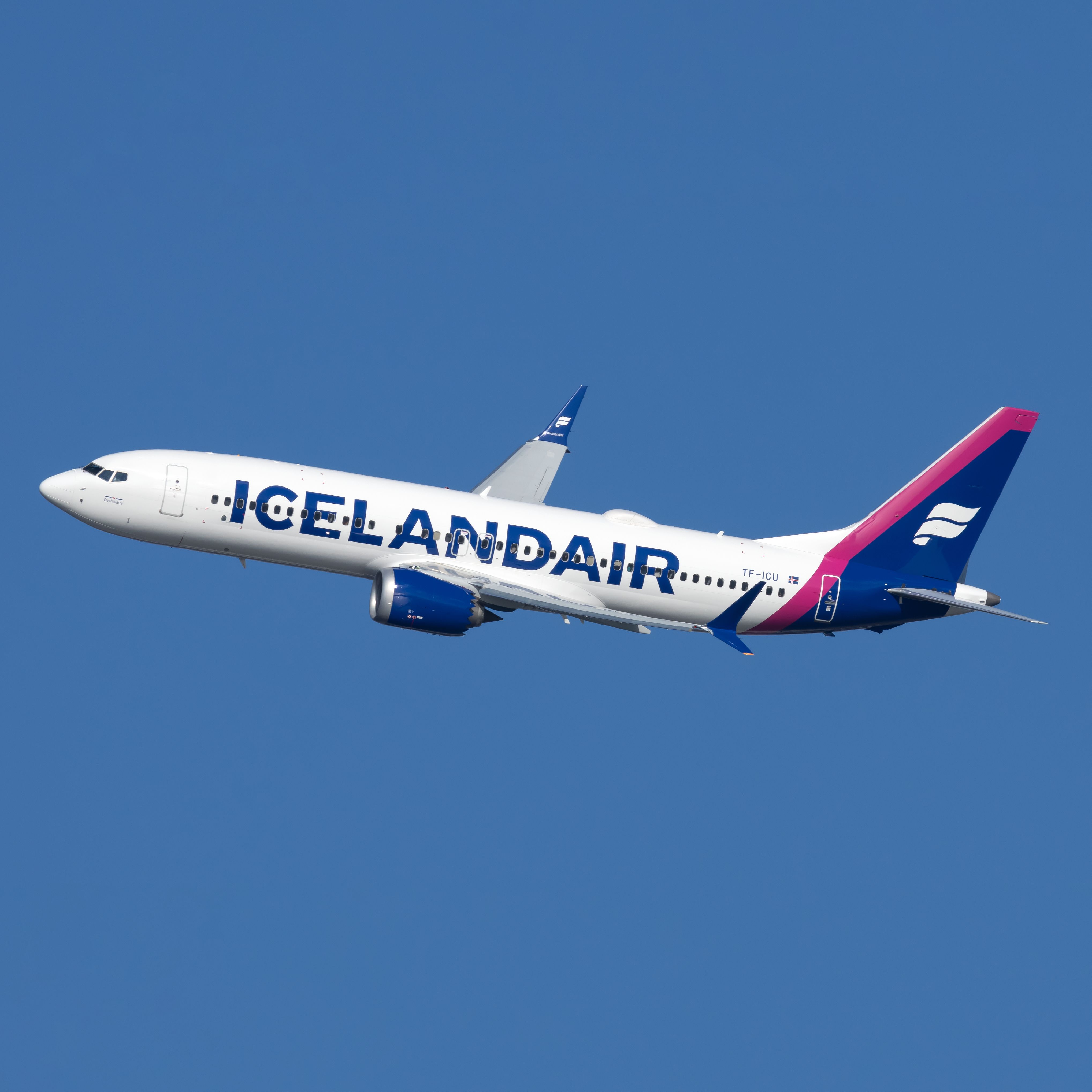An Icelandair Boeing 737 MAX 8 flying in the sky.