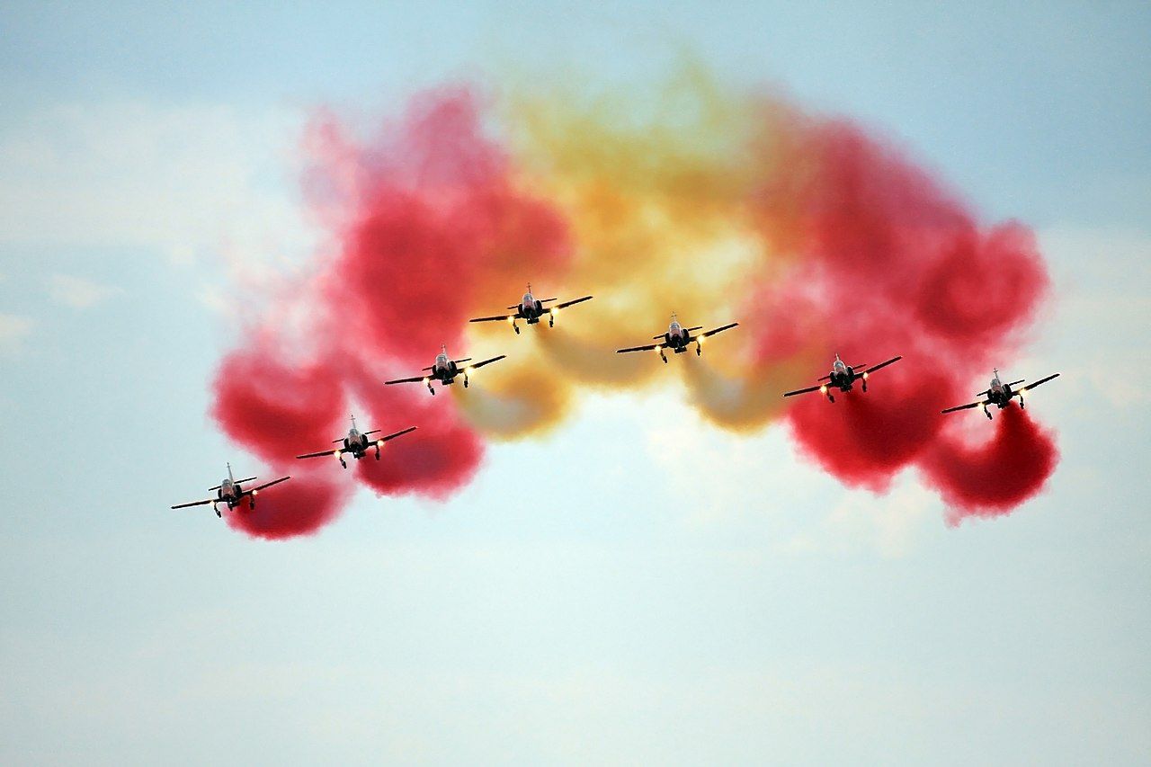 A photo of the Patrulla Aguila flying in formation.