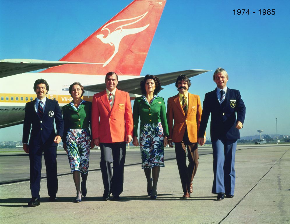 Several Qantas employeed wearing the historic uniforms.