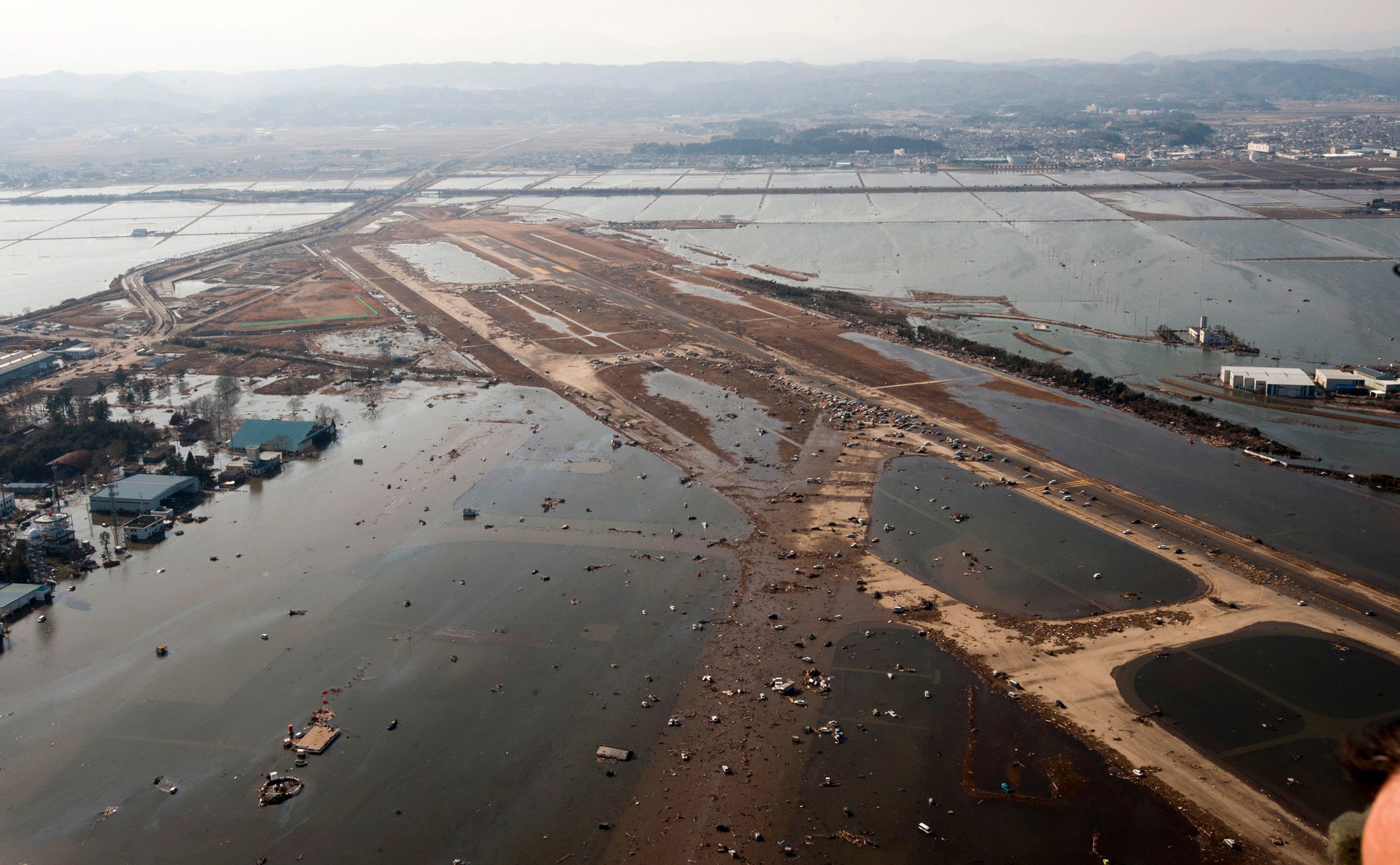 Sendai Airport in ruins from a tsunami.