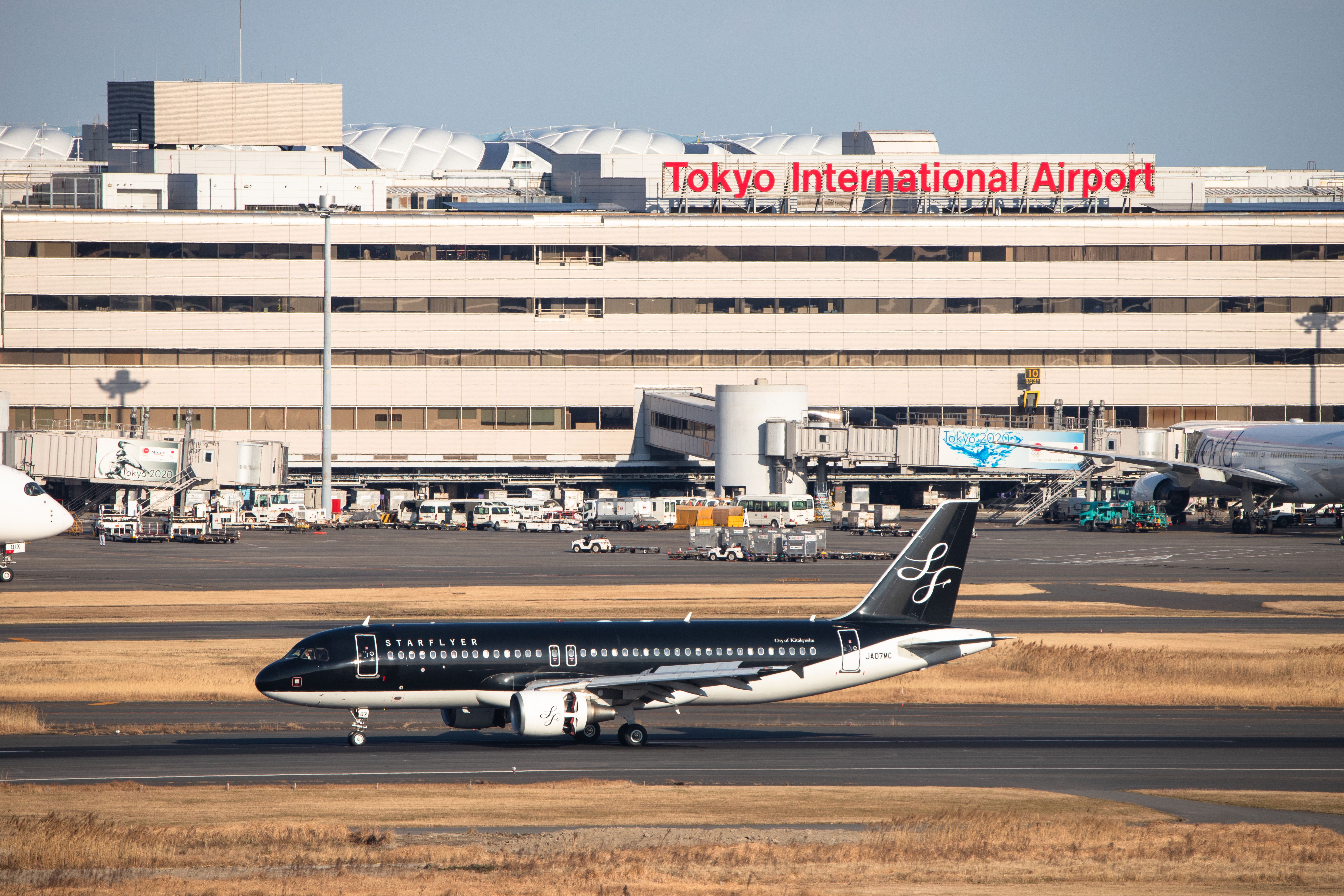 A Starflyer Airbus A320 taxiing at Haneda airport.