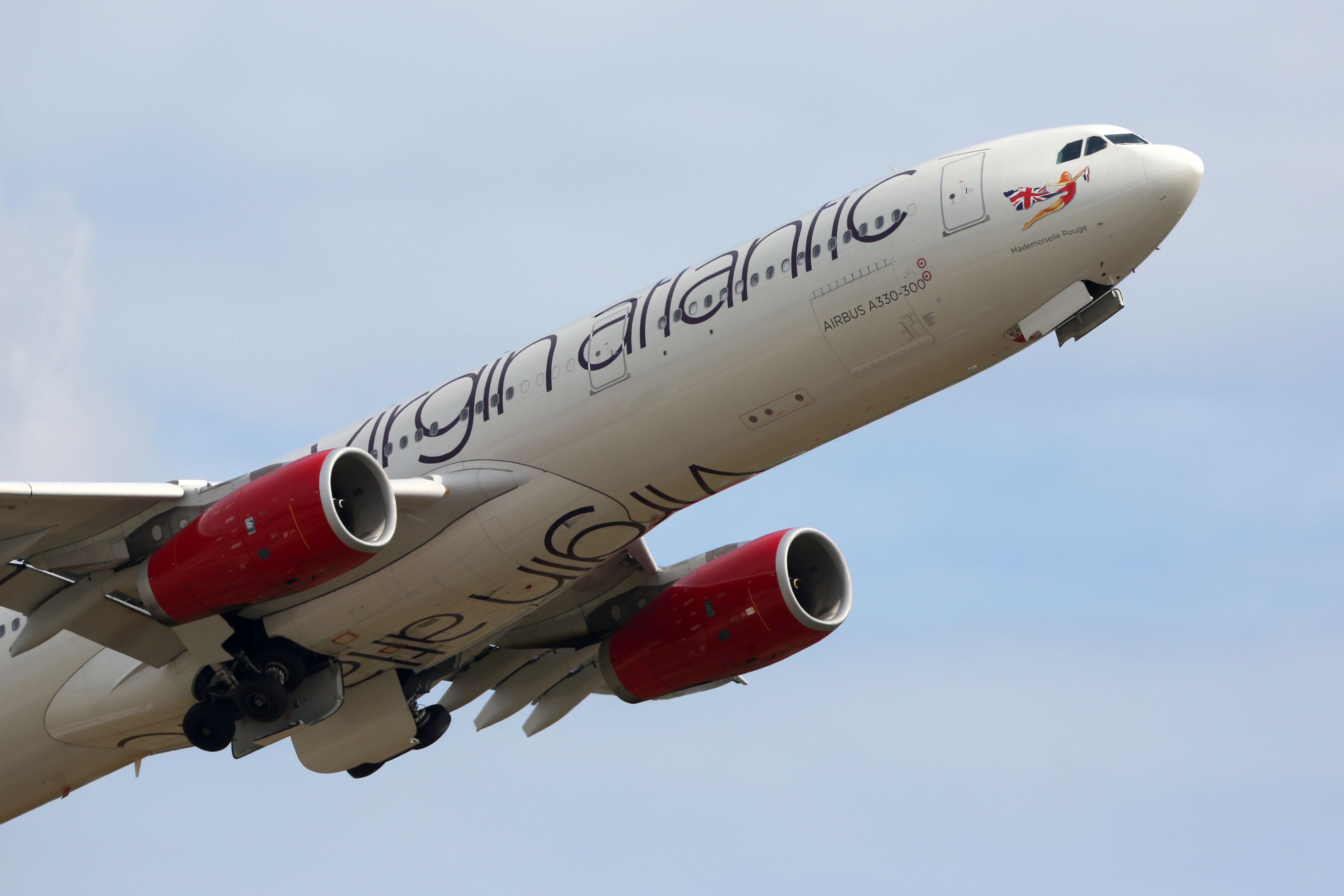 A Virgin Atlantic Airbus A330-300 flying in the sky.
