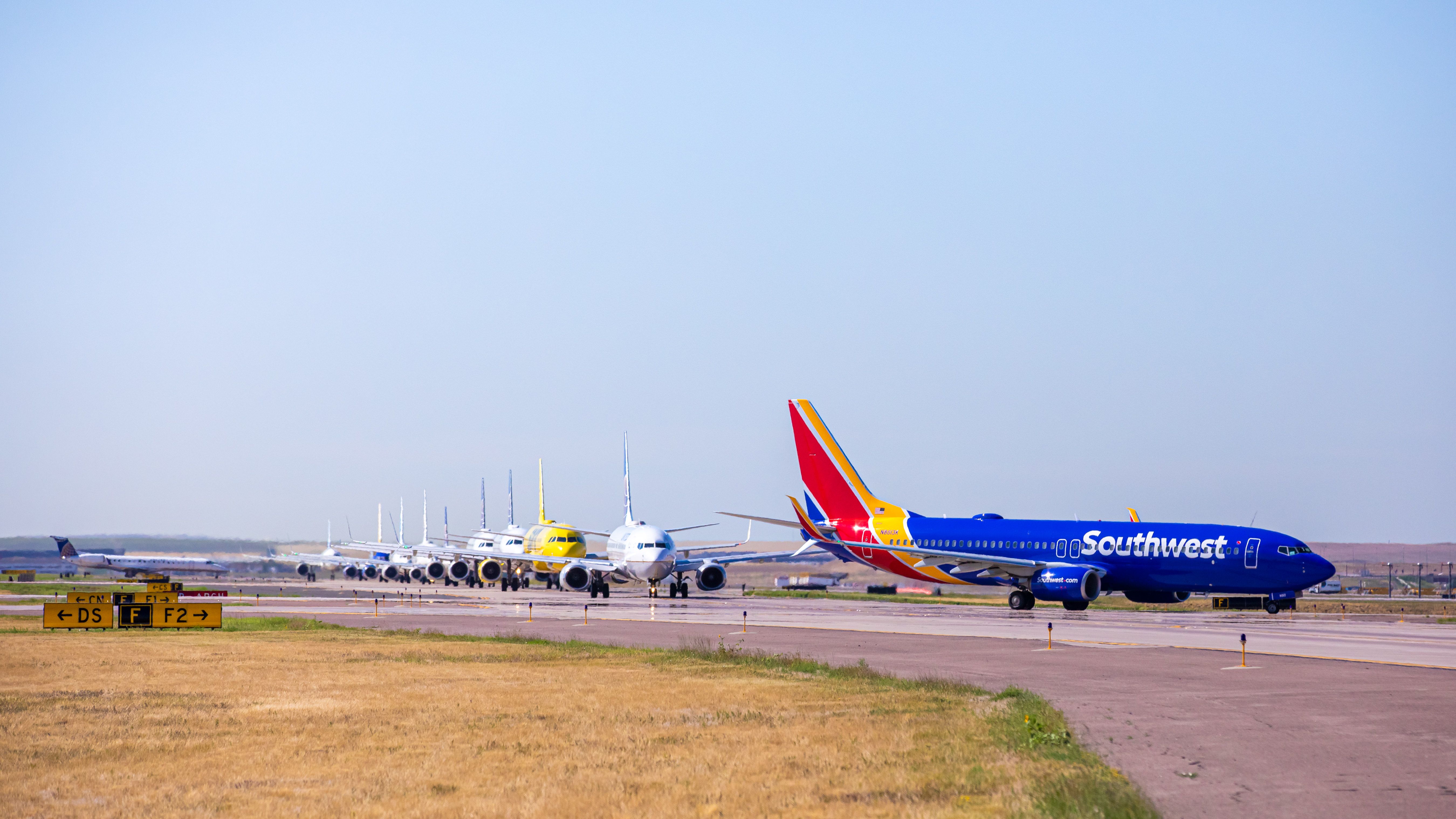 Train of aircraft with Southwest at the front PC DEN