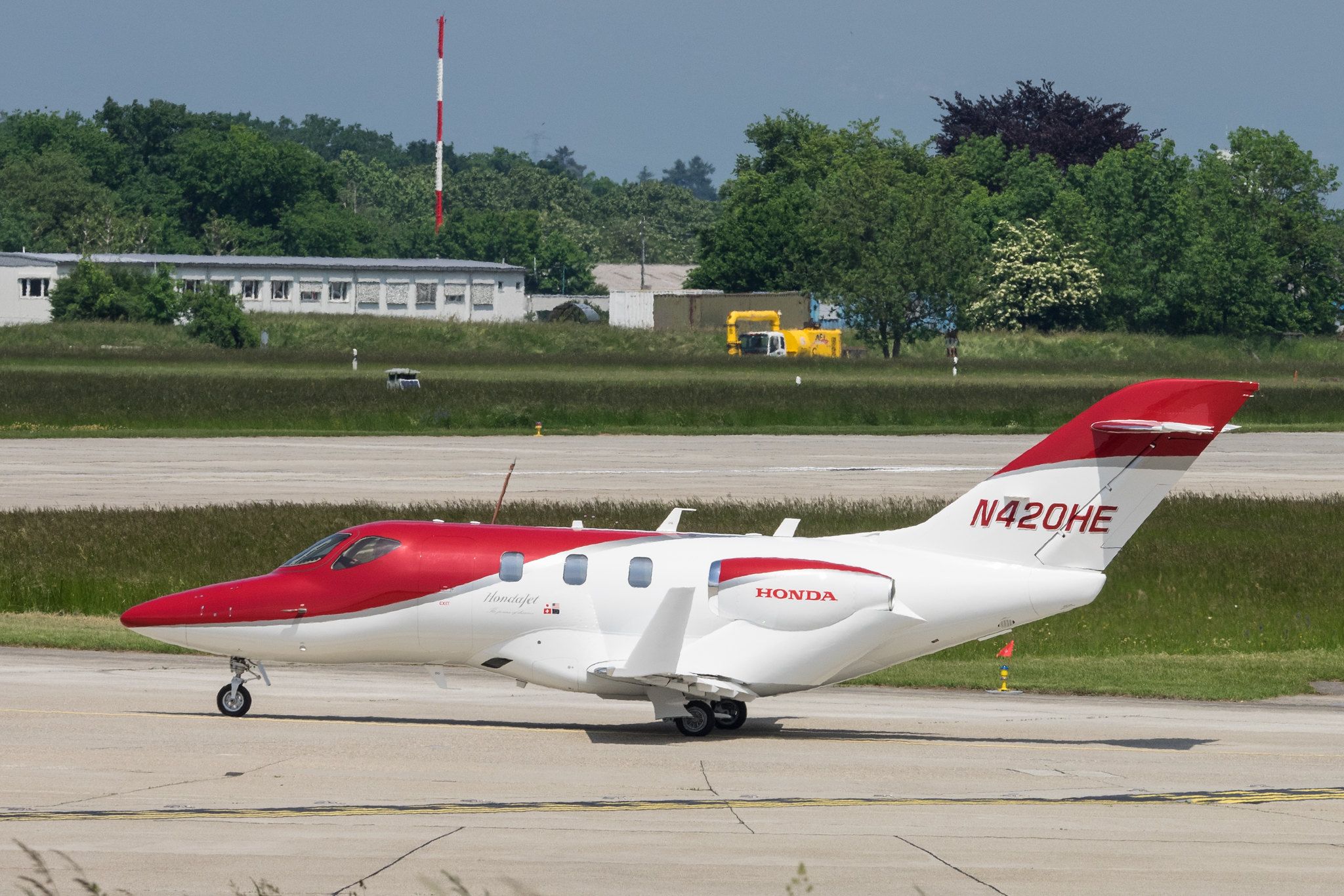 A HondaJet taxiing to the runway.