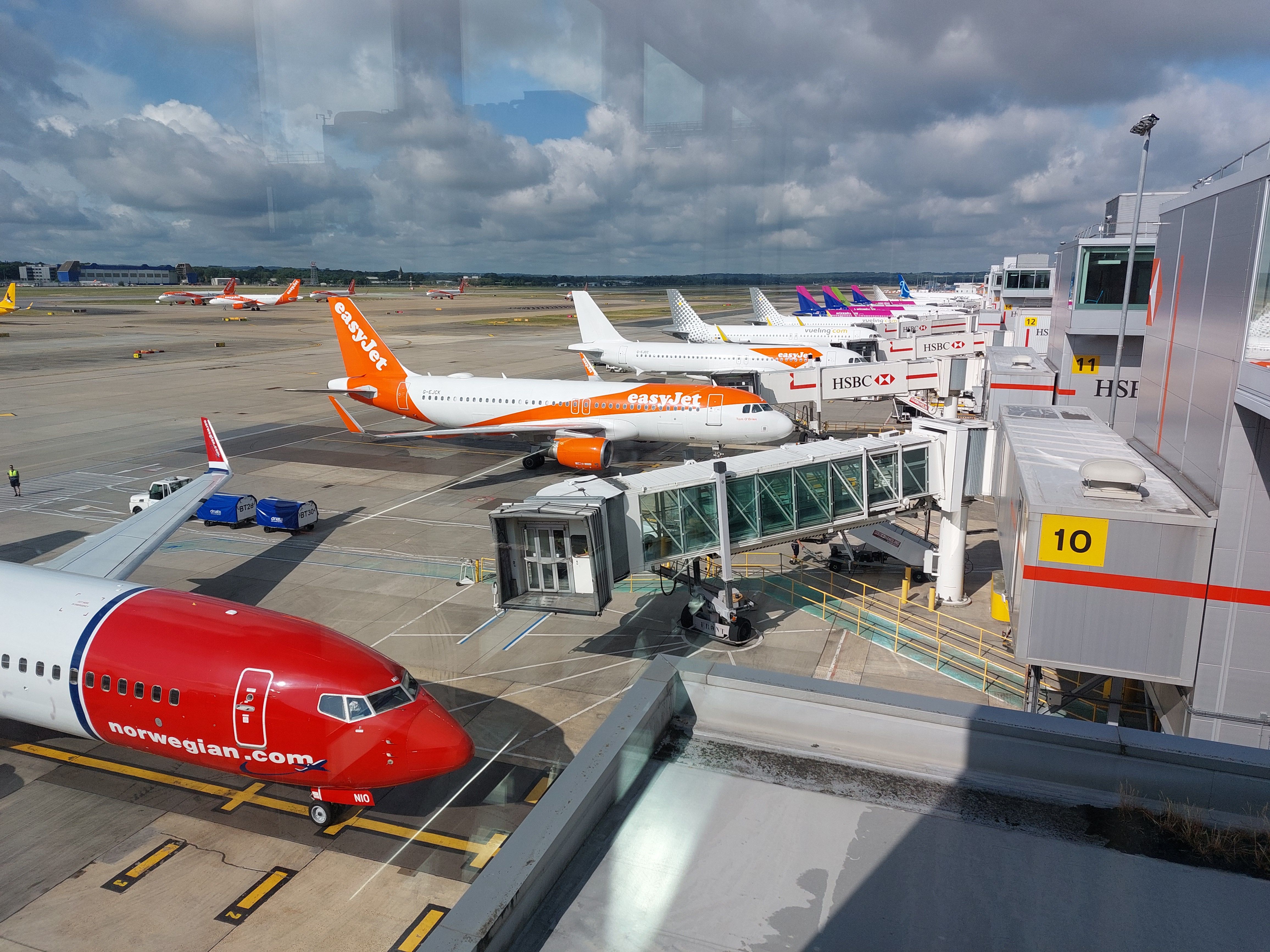Narrowbody Airliners Lined Up At London Gatwick Airport.